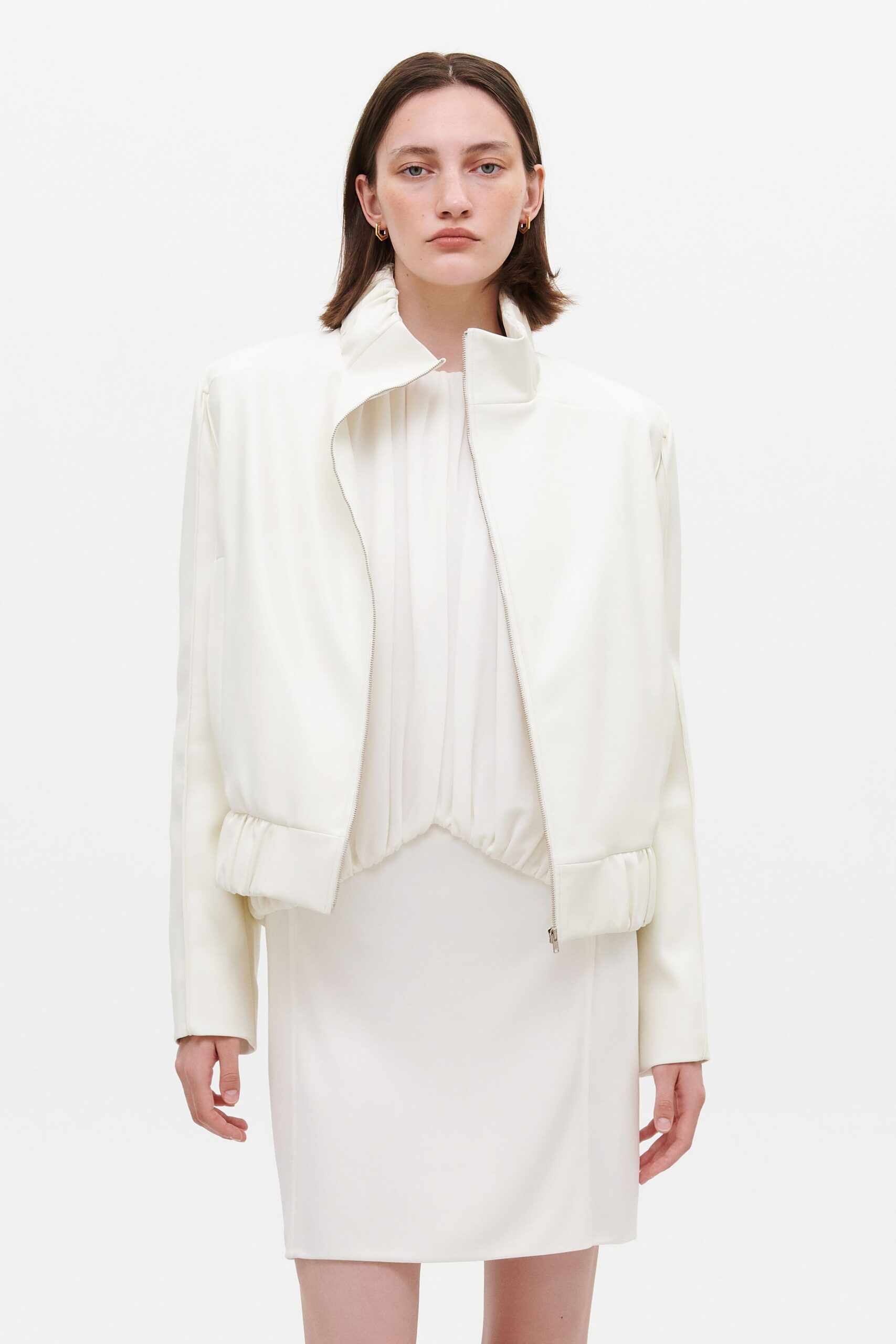 white leather long-sleeve collared fitted zippered jacket
