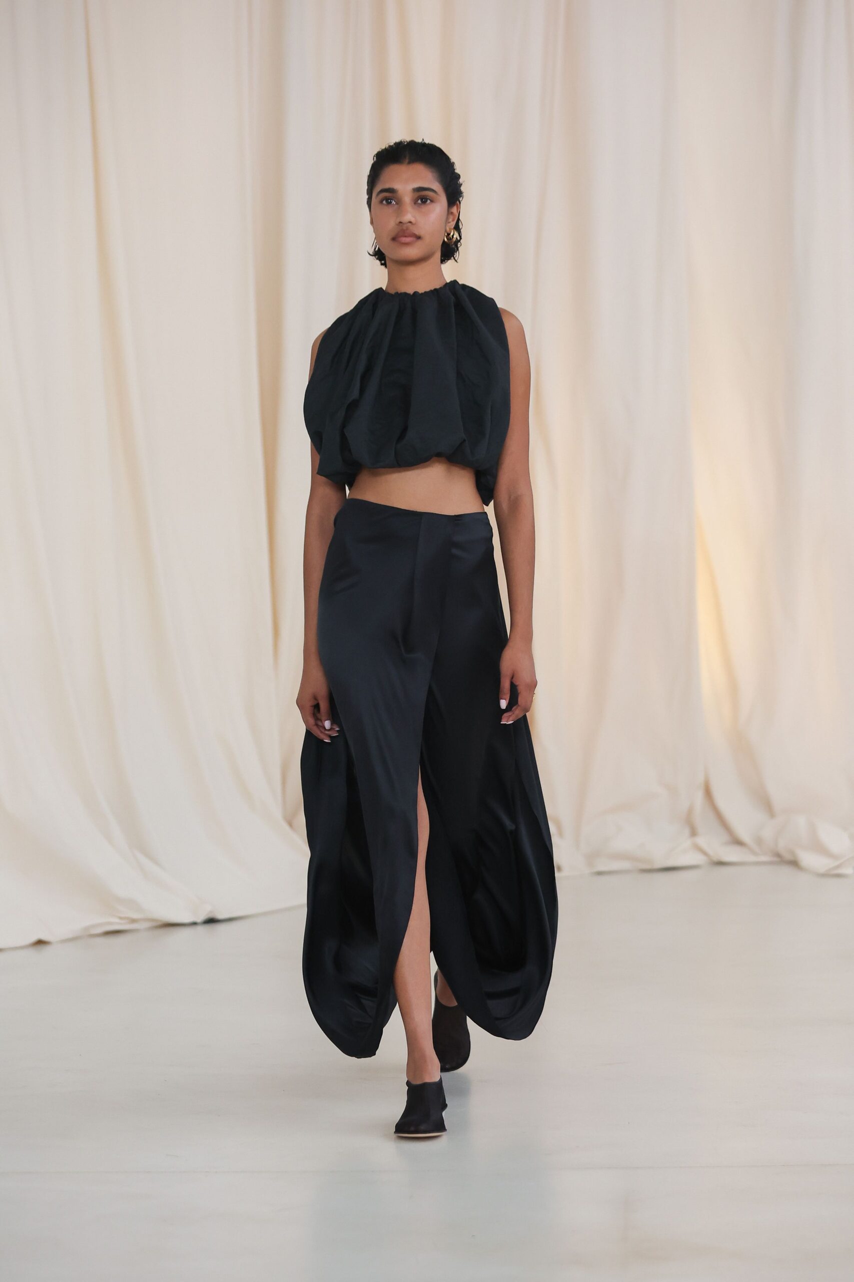 black silk sleeveless high-neck oversized draped layered top