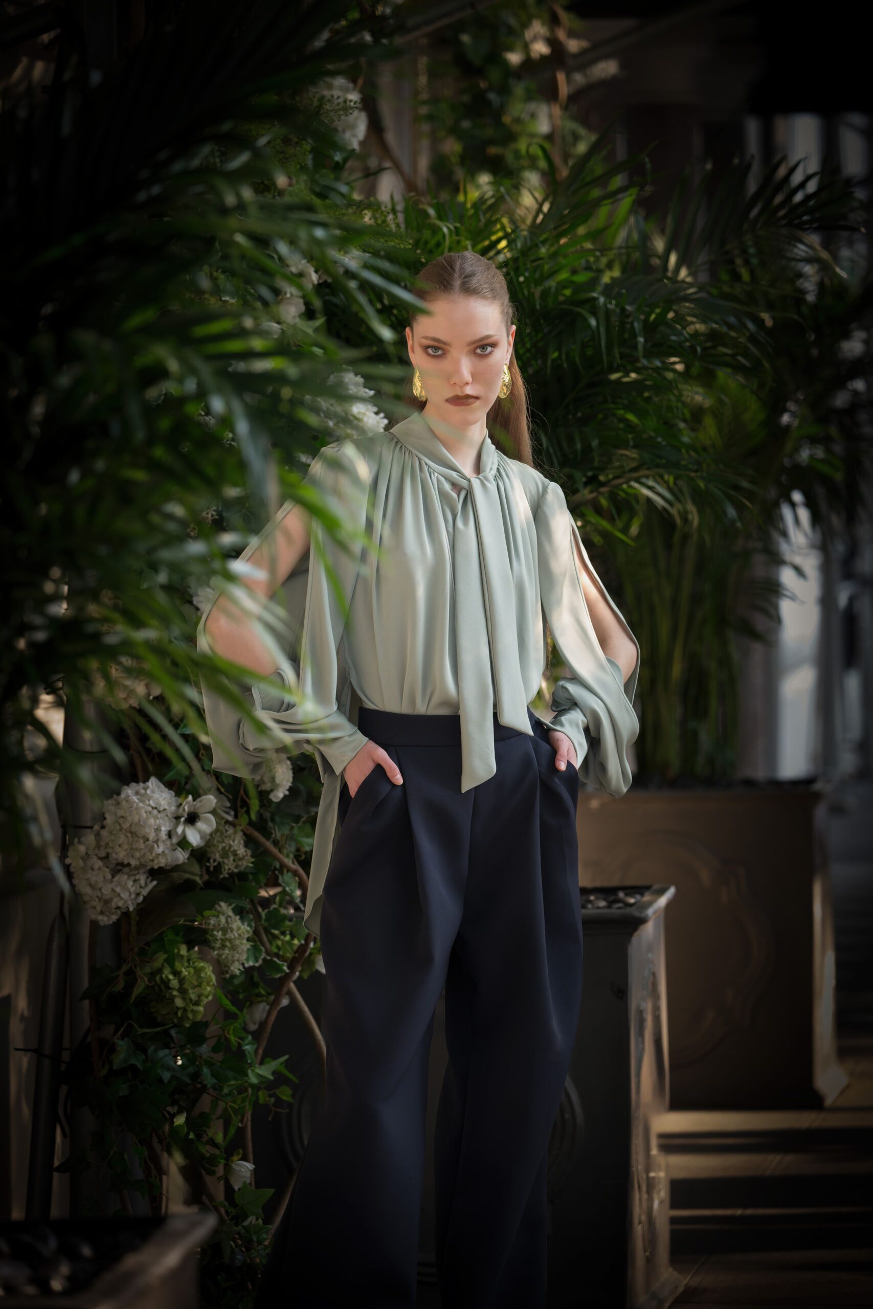 ivory draped blouse with black pants