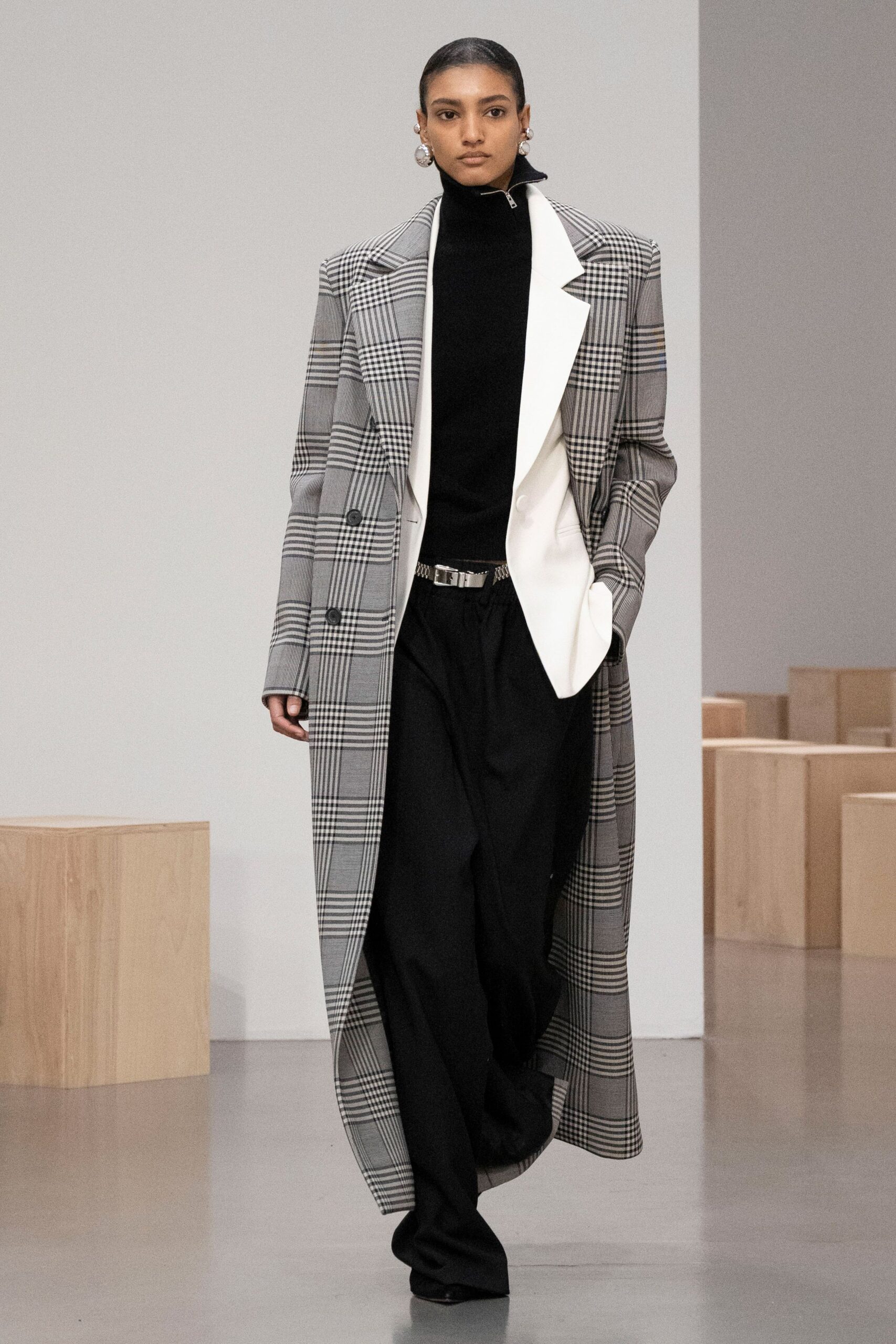 gray checked coat with black top