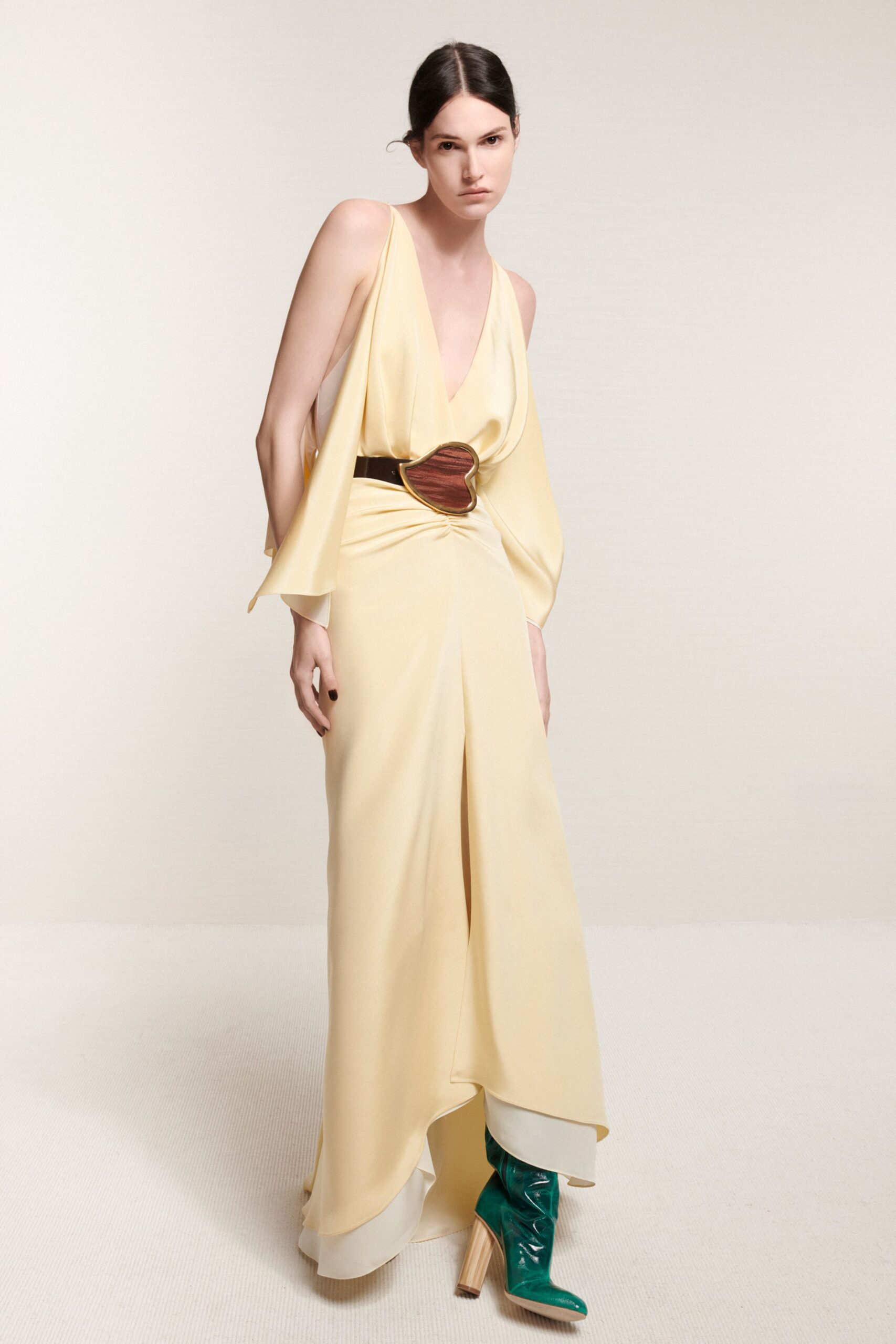 yellow silk sleeveless v-neck fitted draped flowing gown