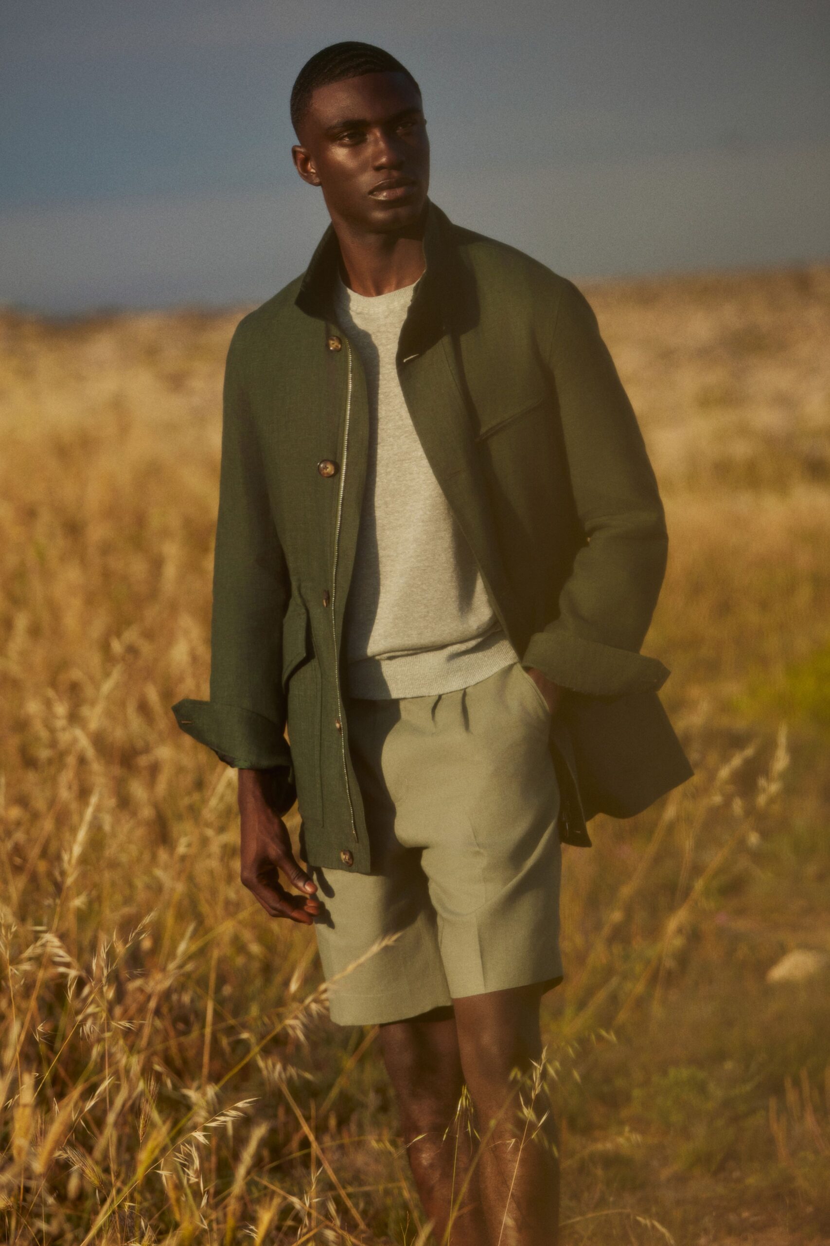 green cotton tailored pleated short shorts