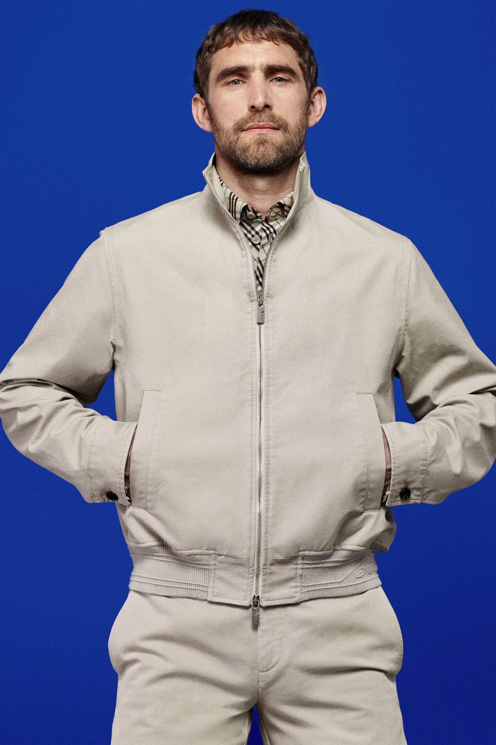 beige cotton jacket with checked shirt