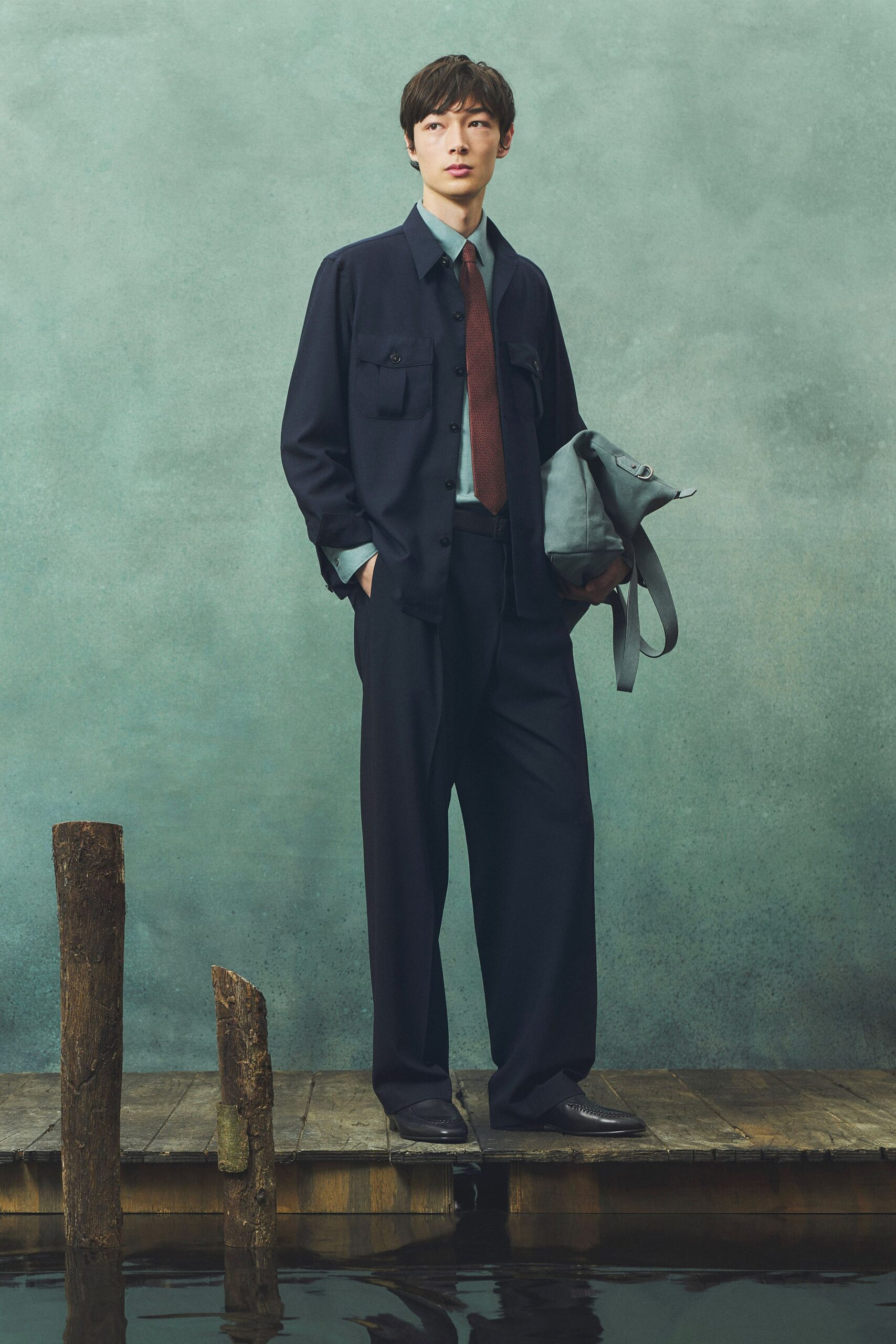 black relaxed jacket with blue shirt