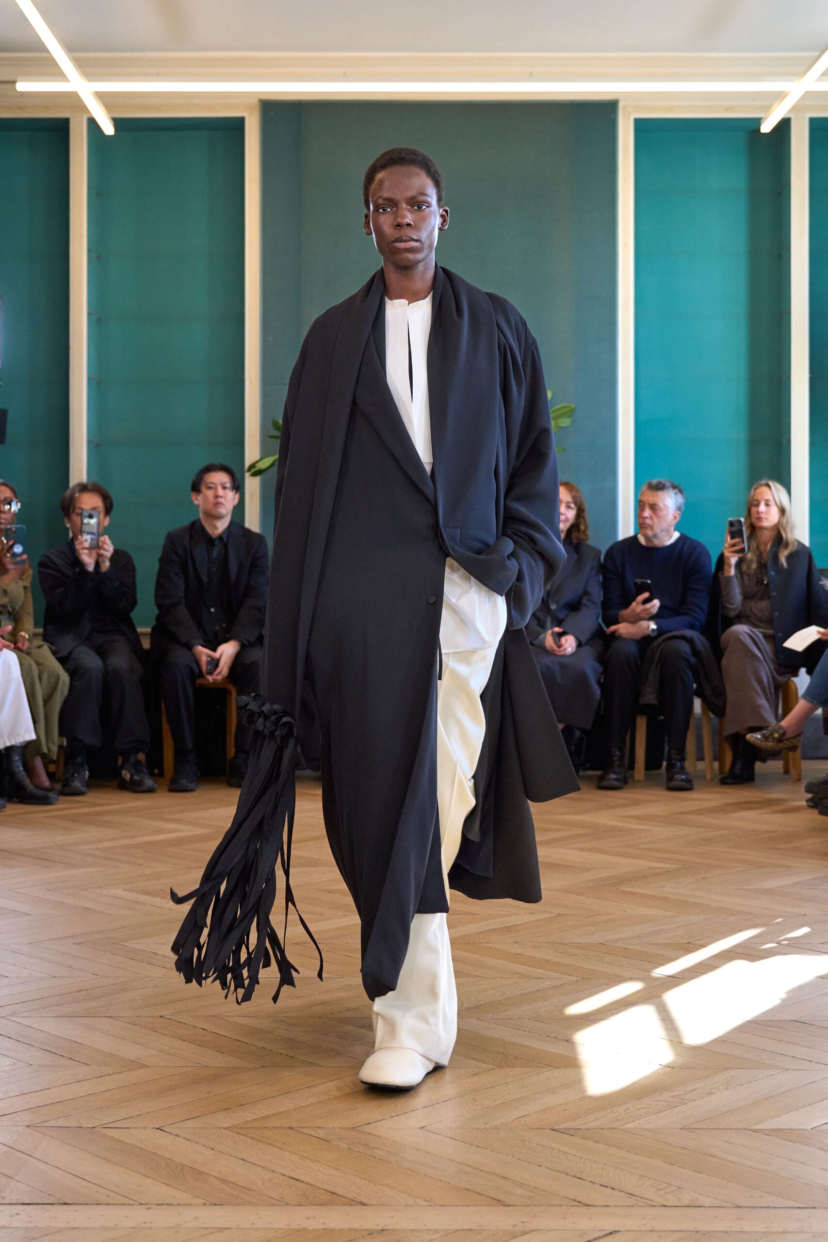 black wool long-sleeve collared relaxed draped coat