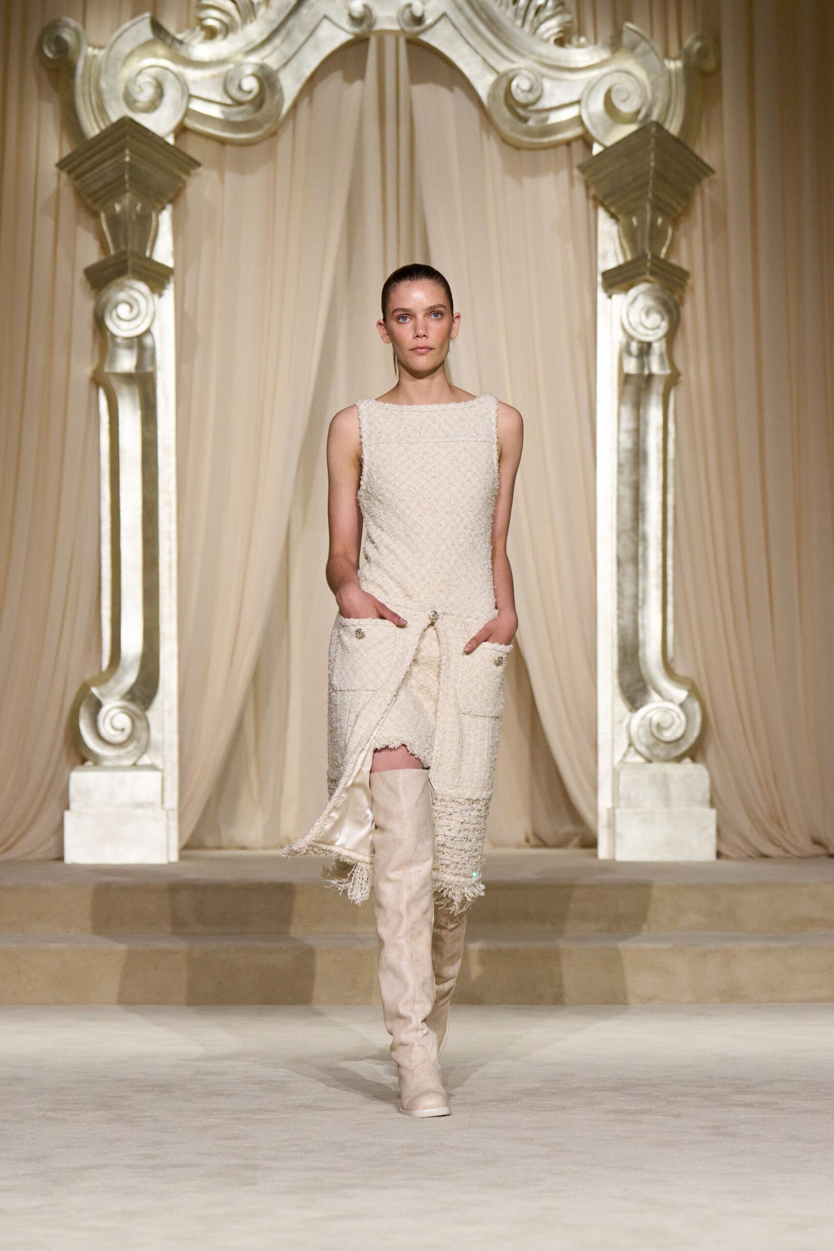 beige pleated midi dress with boots