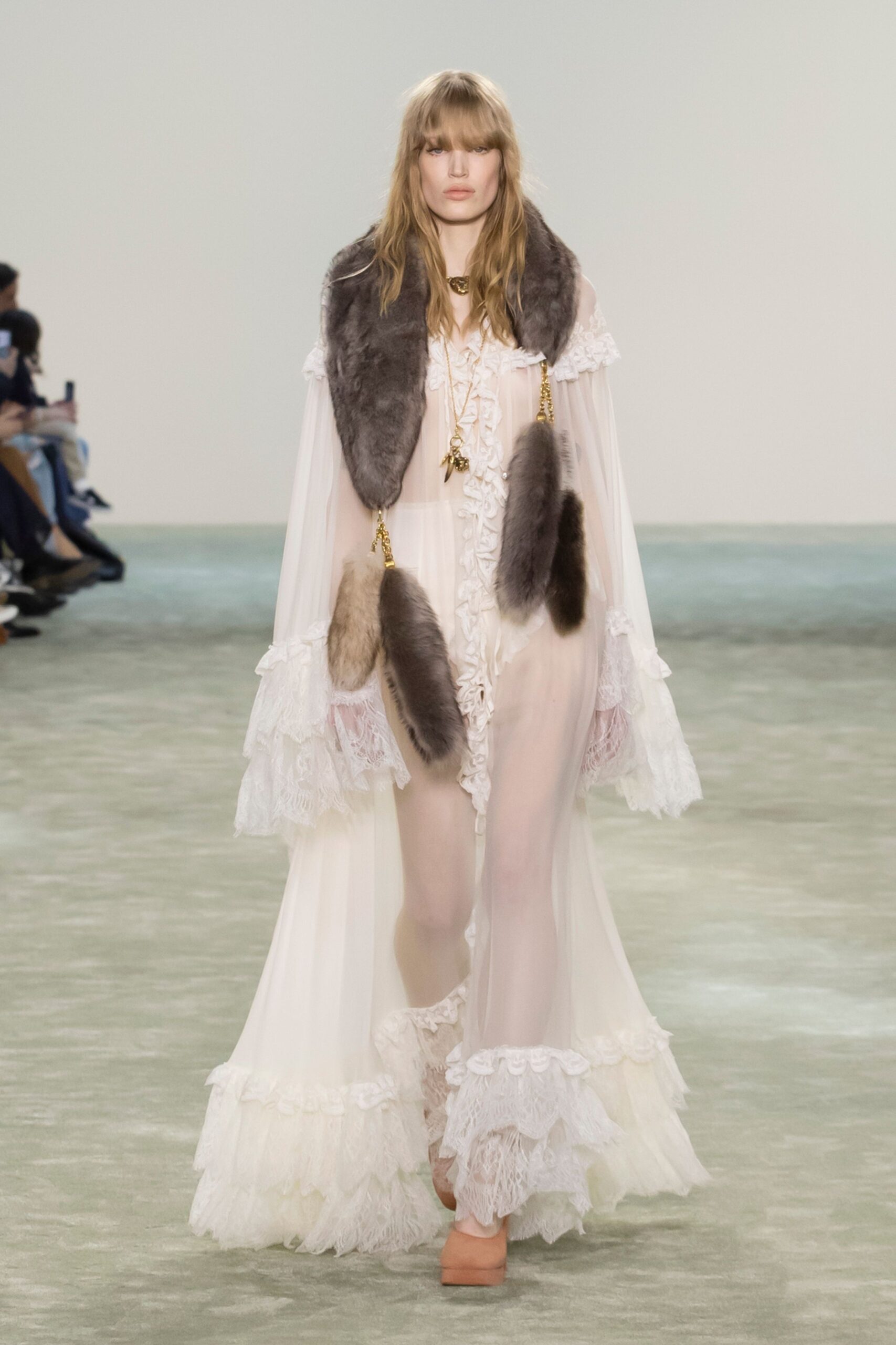 white silk gown with cape