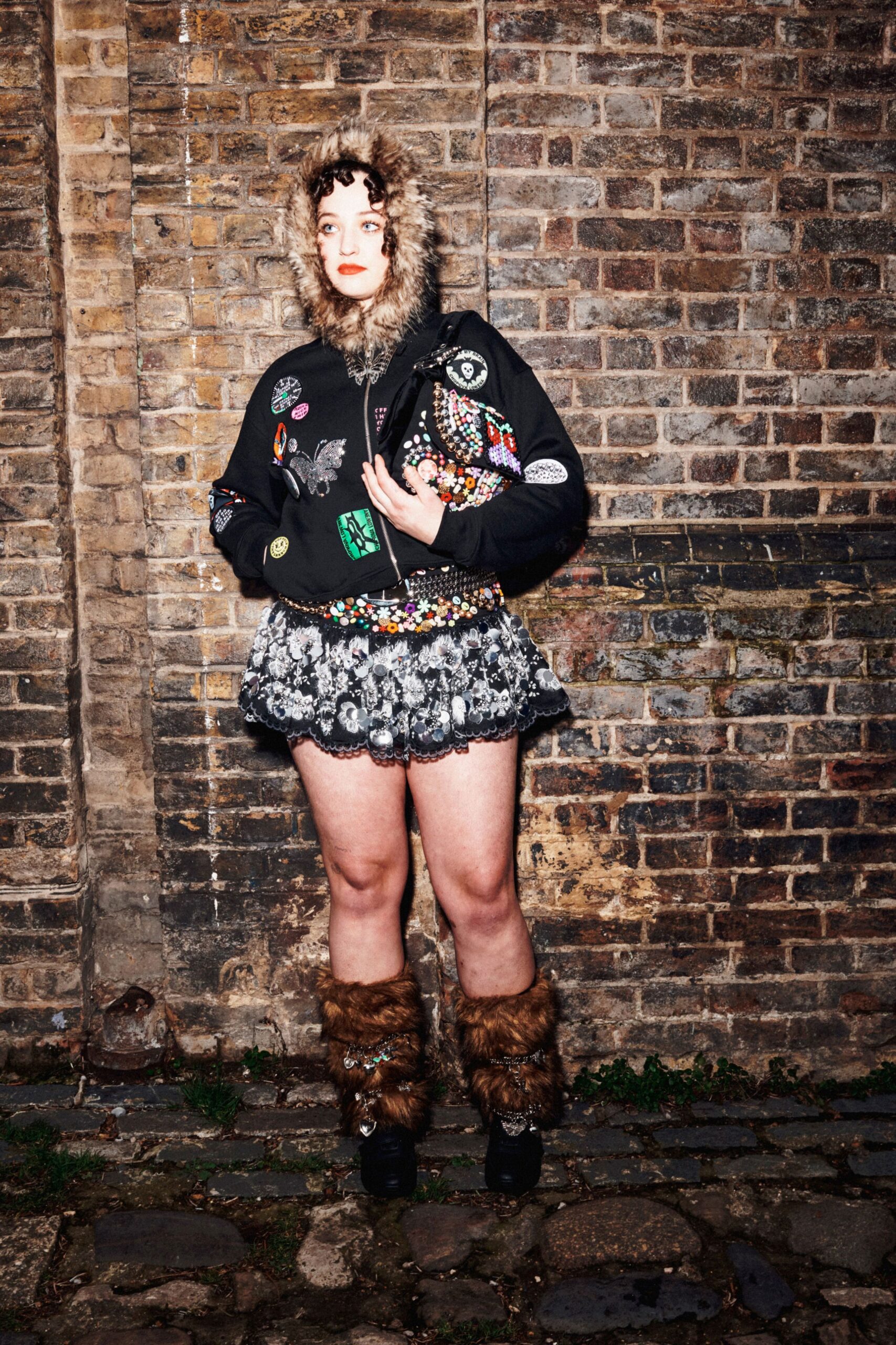 black embroidered jacket with mini skirt
