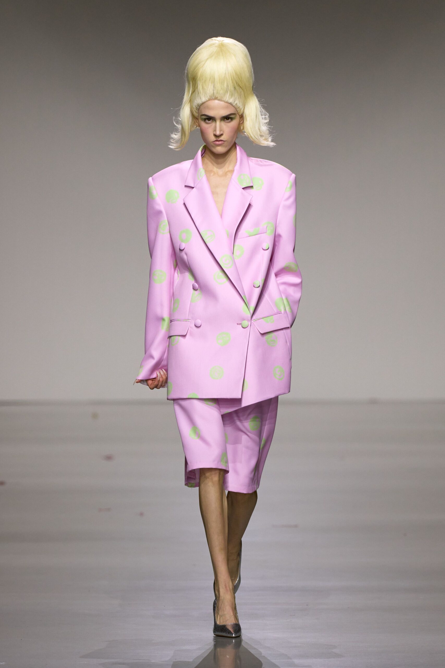 pink tailored blazer and skirt