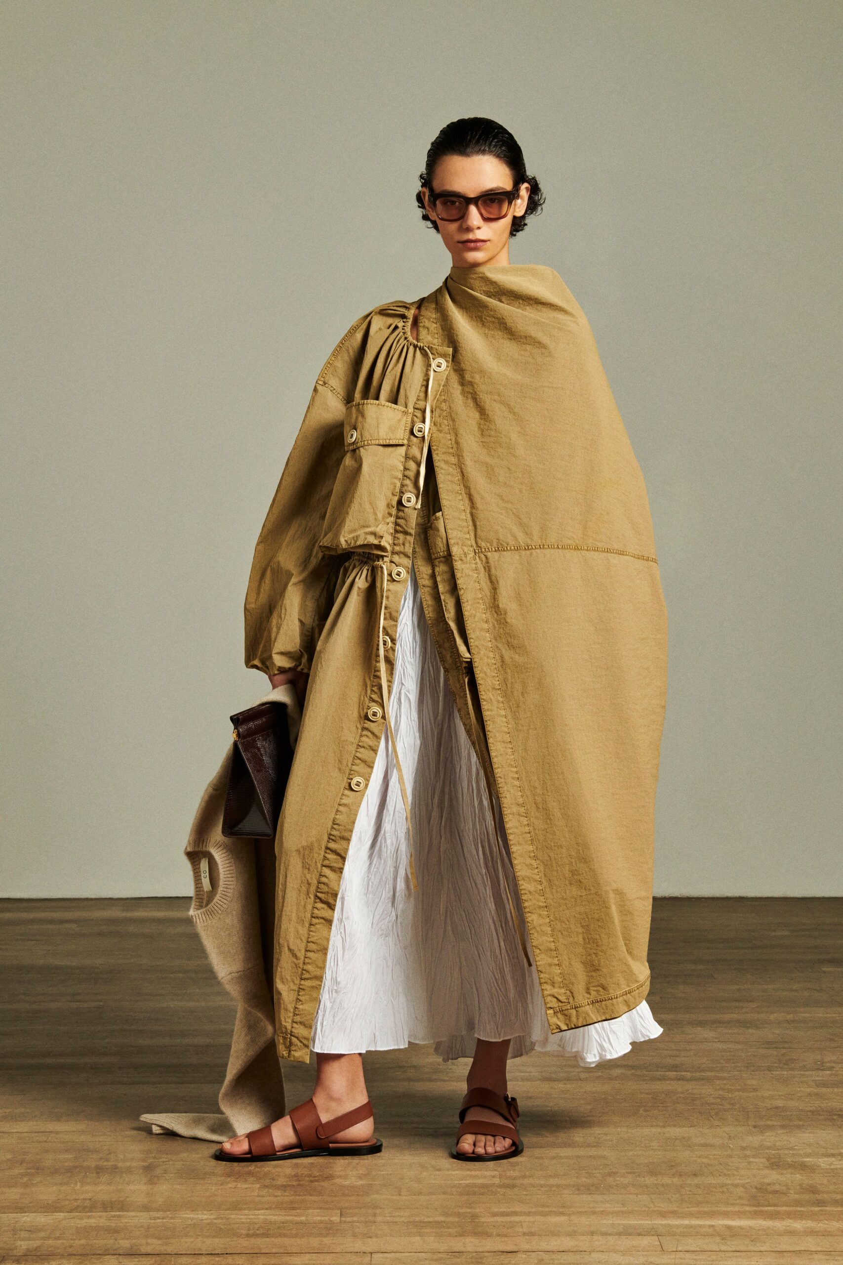 beige coat white pleated dress