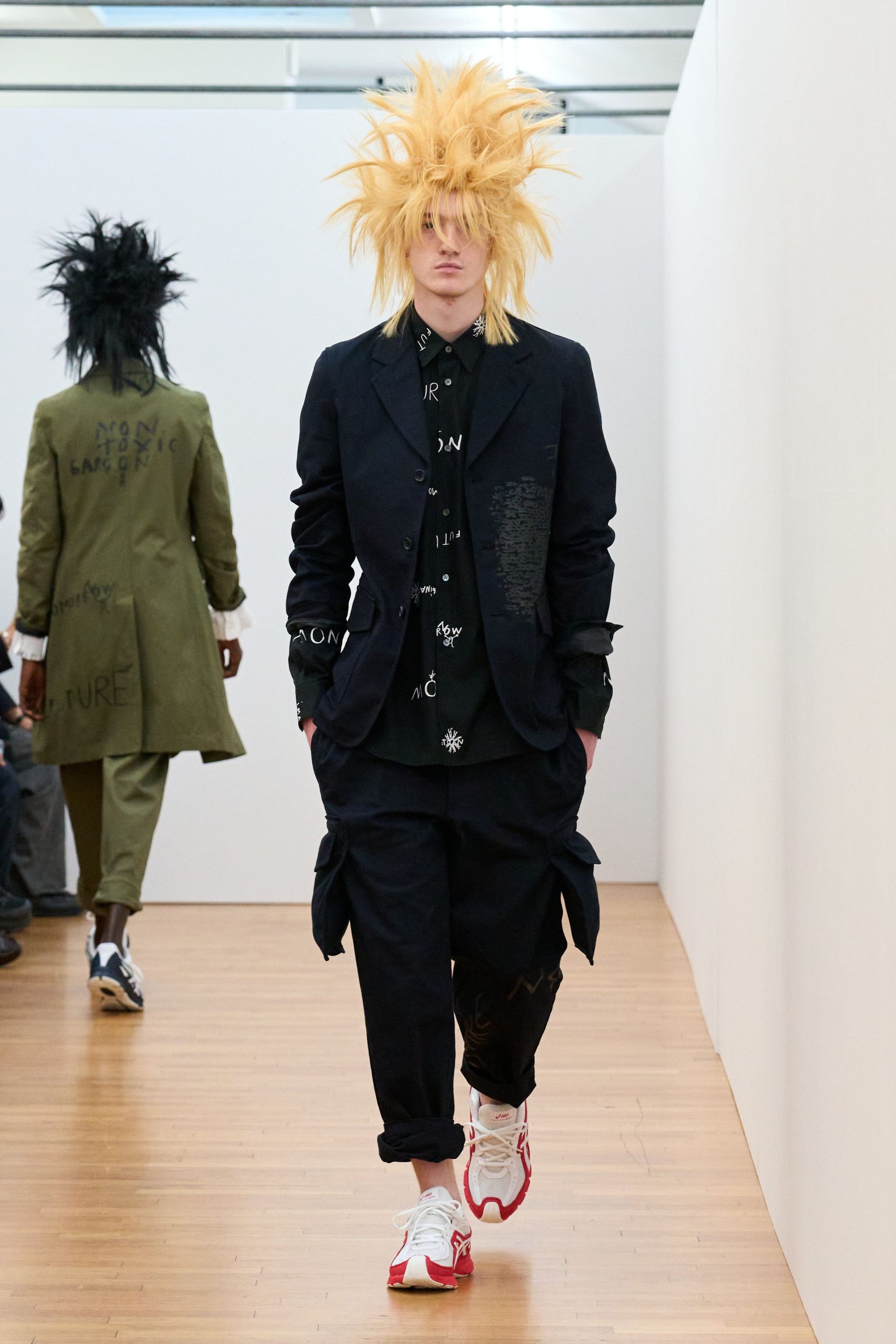 black tailored suit with relaxed pants
