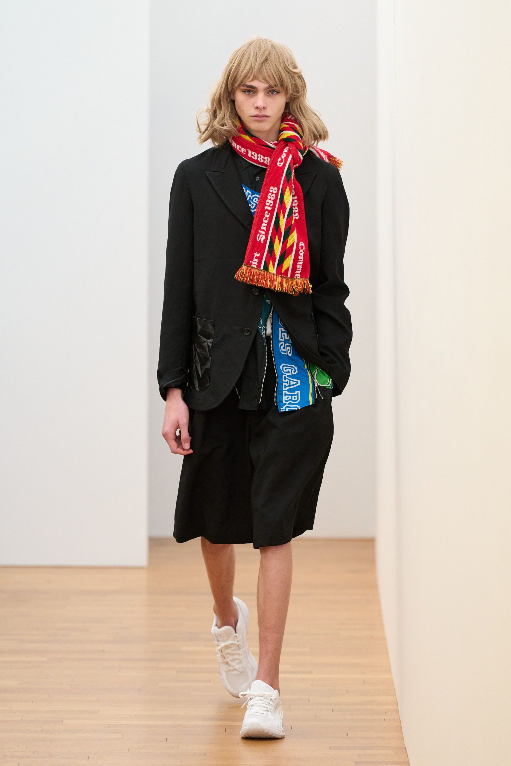 black blazer with blue t-shirt and shorts