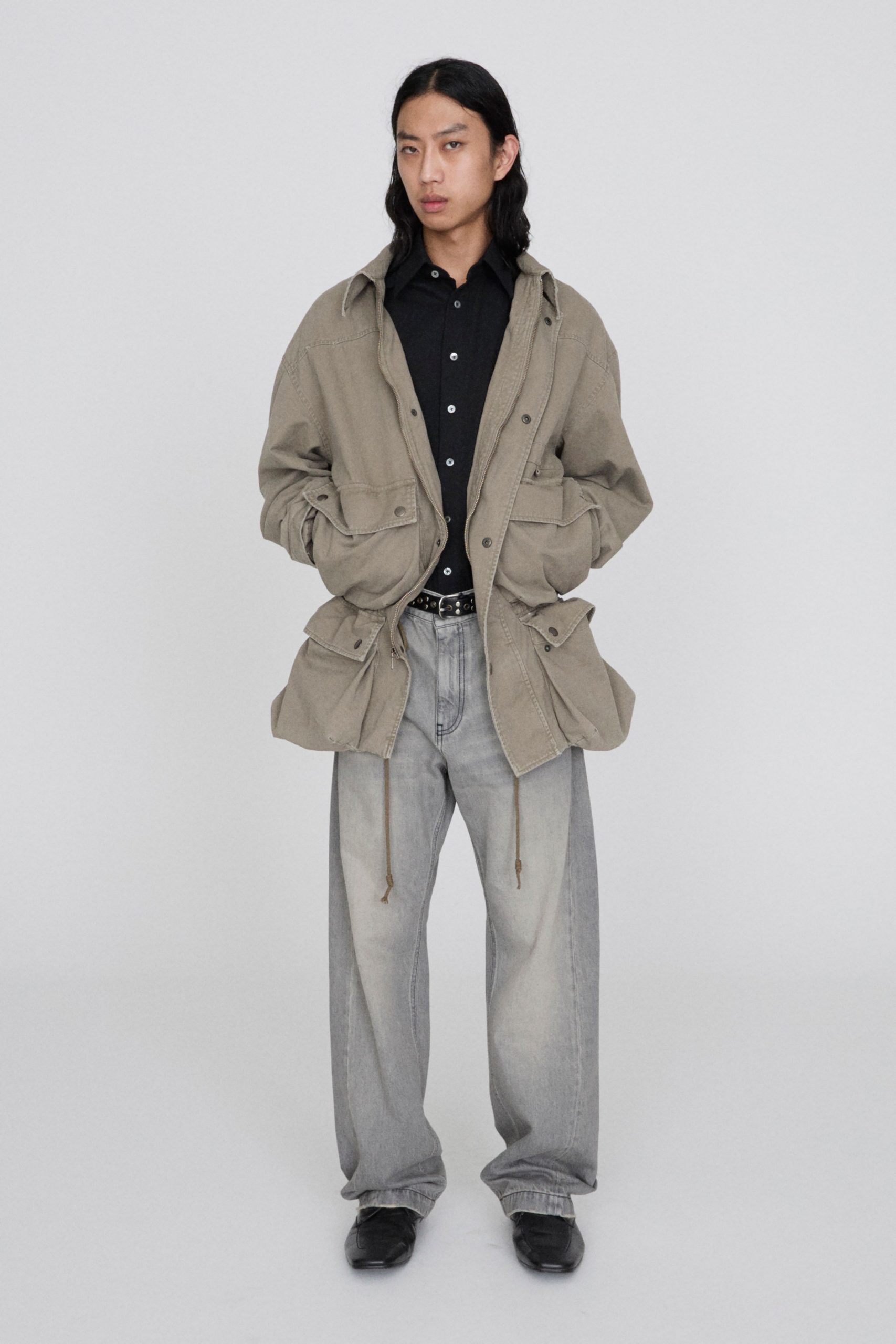 beige relaxed jacket with black shirt