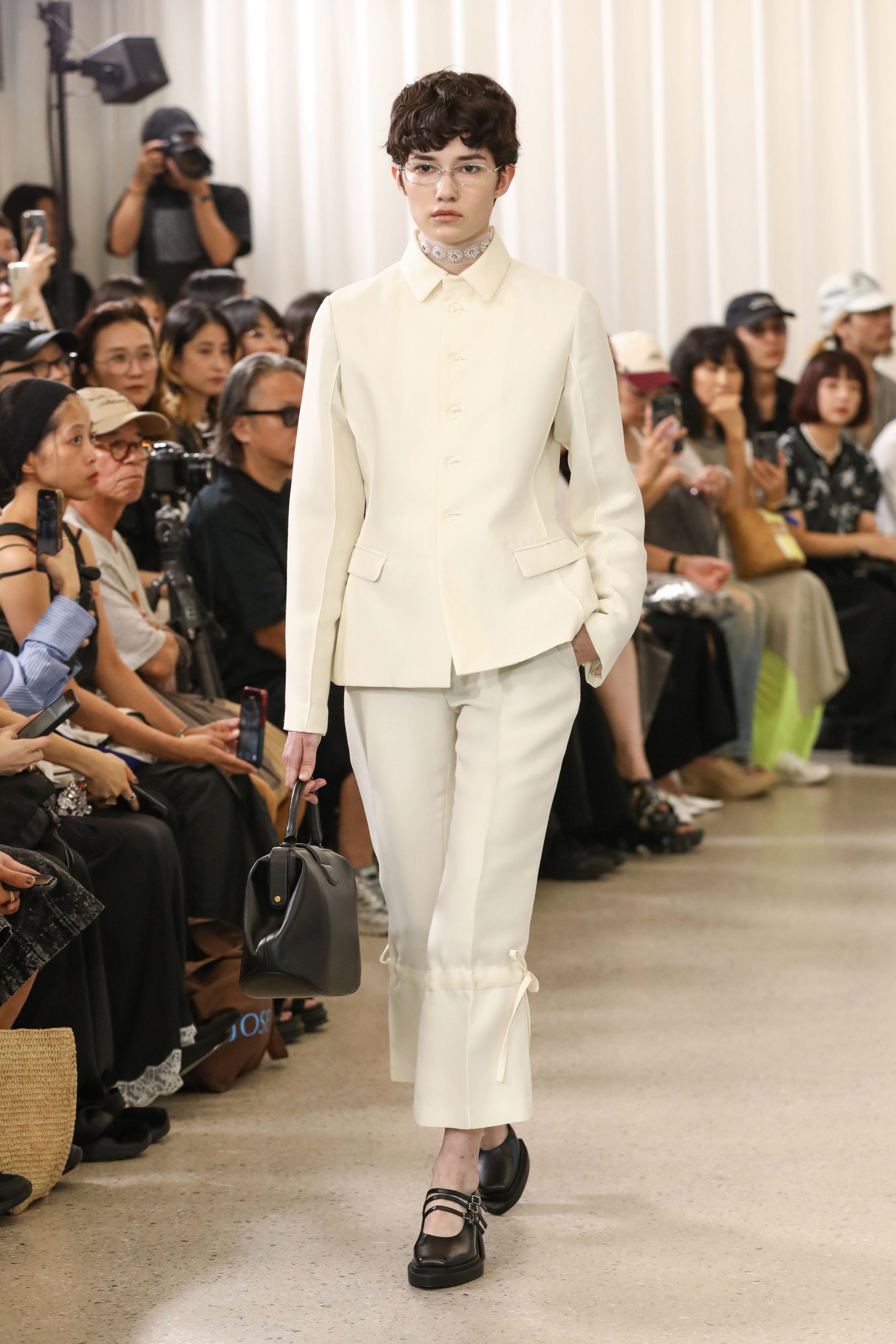 white blazer and tailored pants