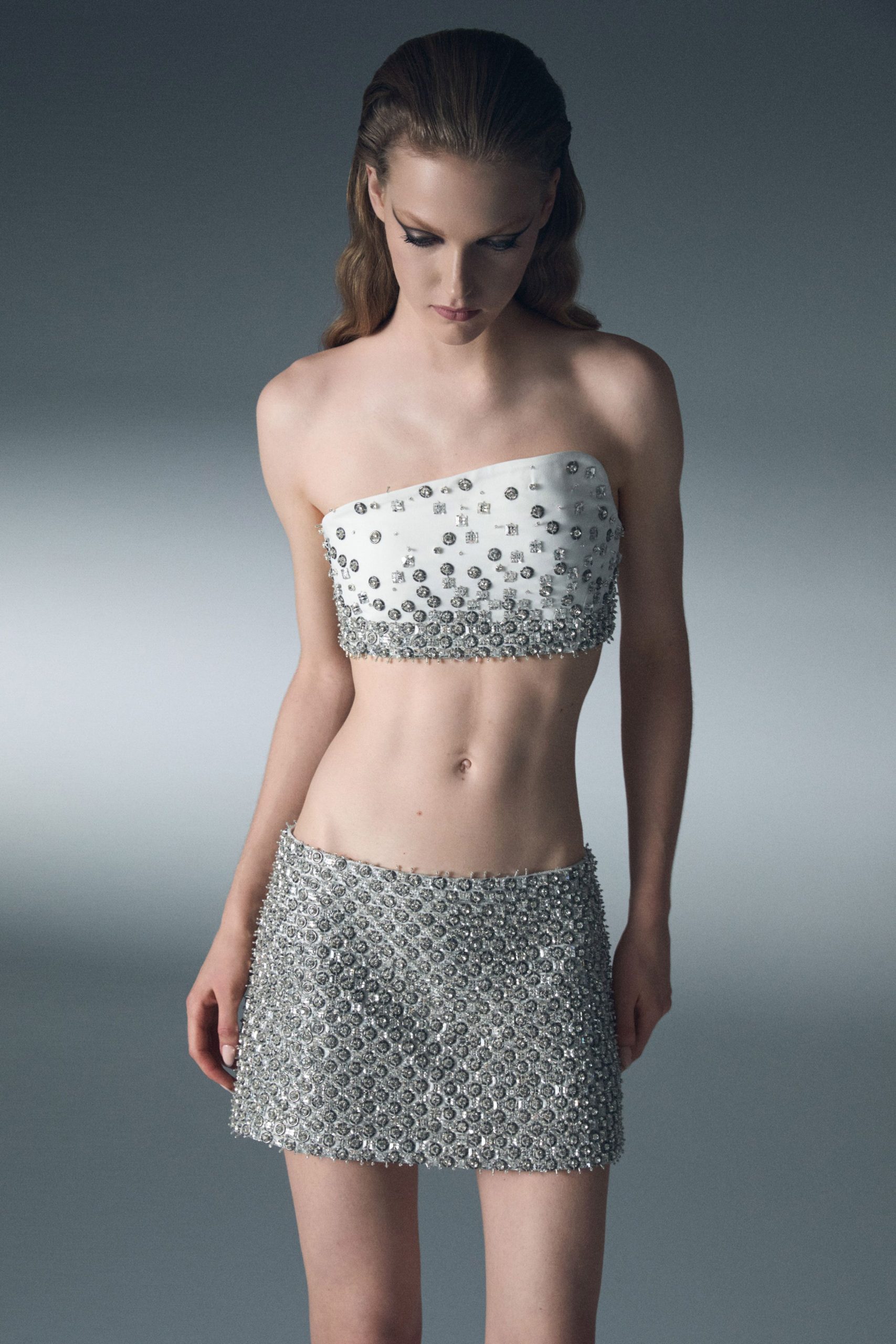white silk sleeveless strapless fitted beaded short crop-top