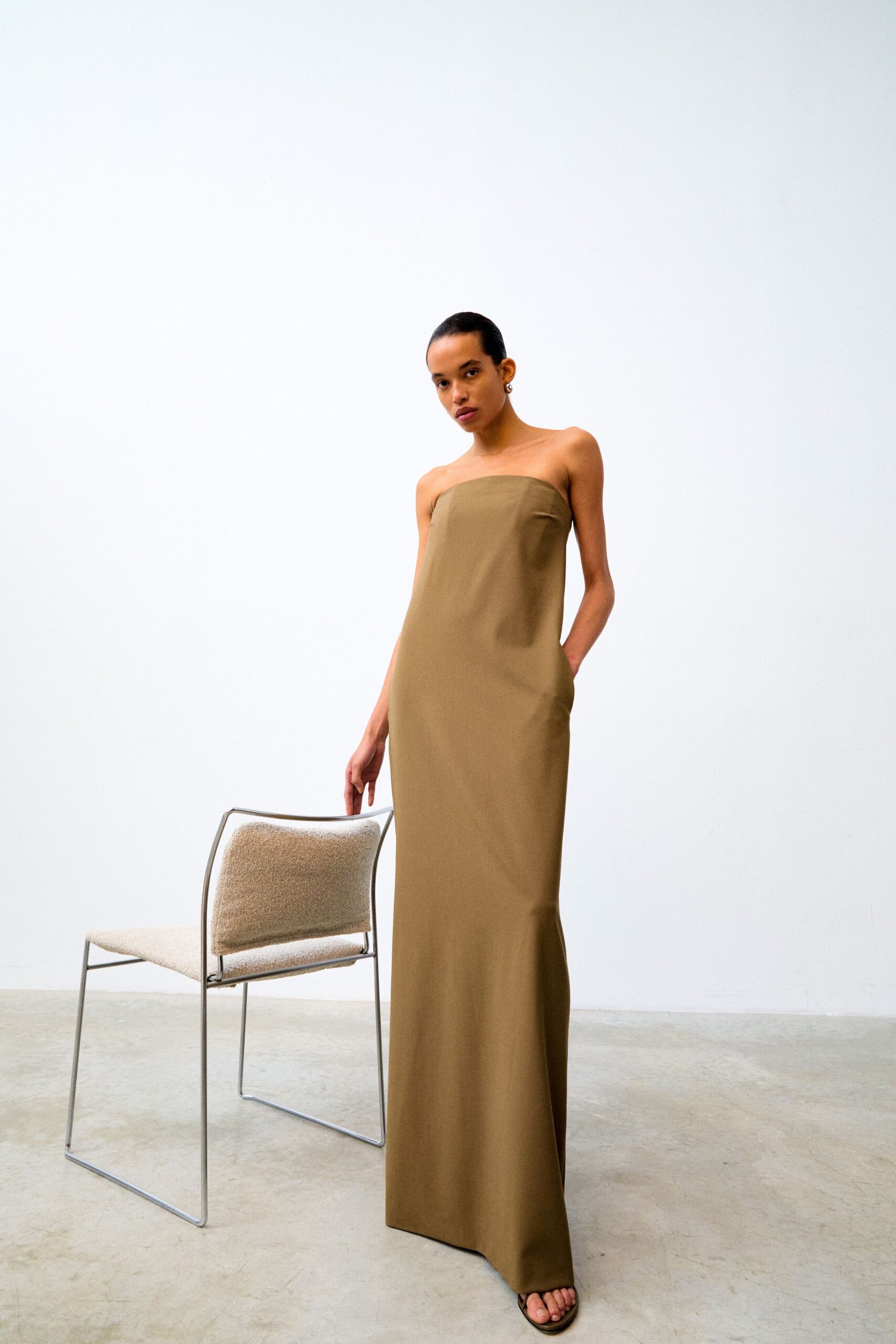 brown strapless maxi gown with sandals