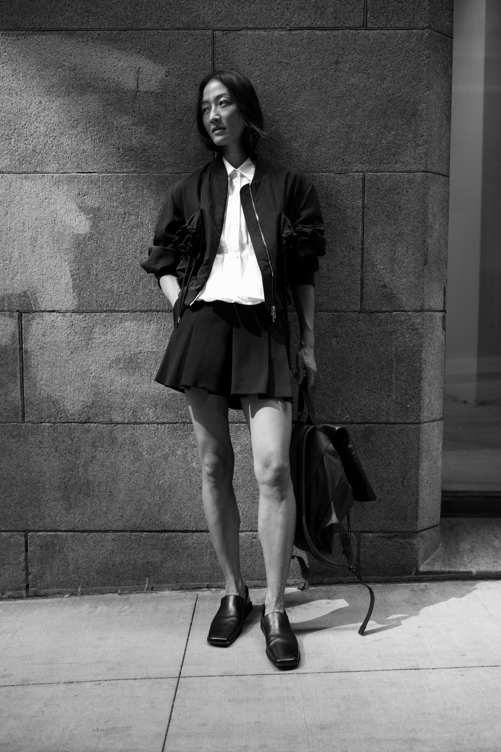 black cotton long-sleeve collared fitted ruffled jacket