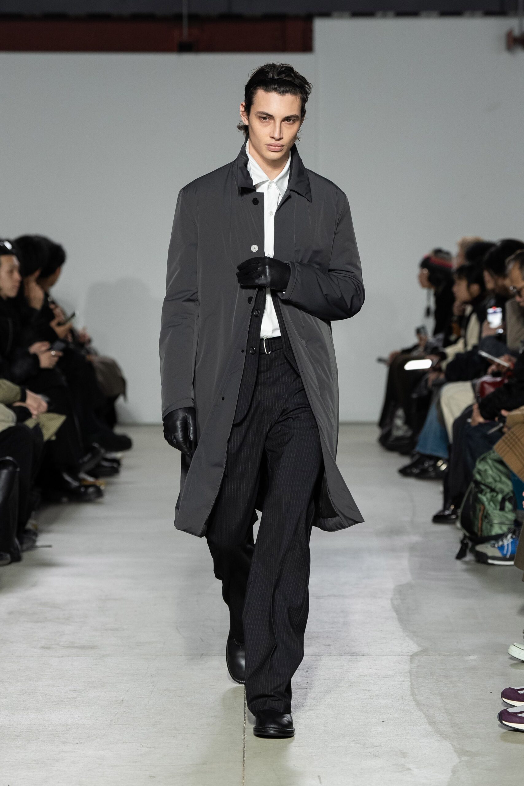 gray coat with black pants