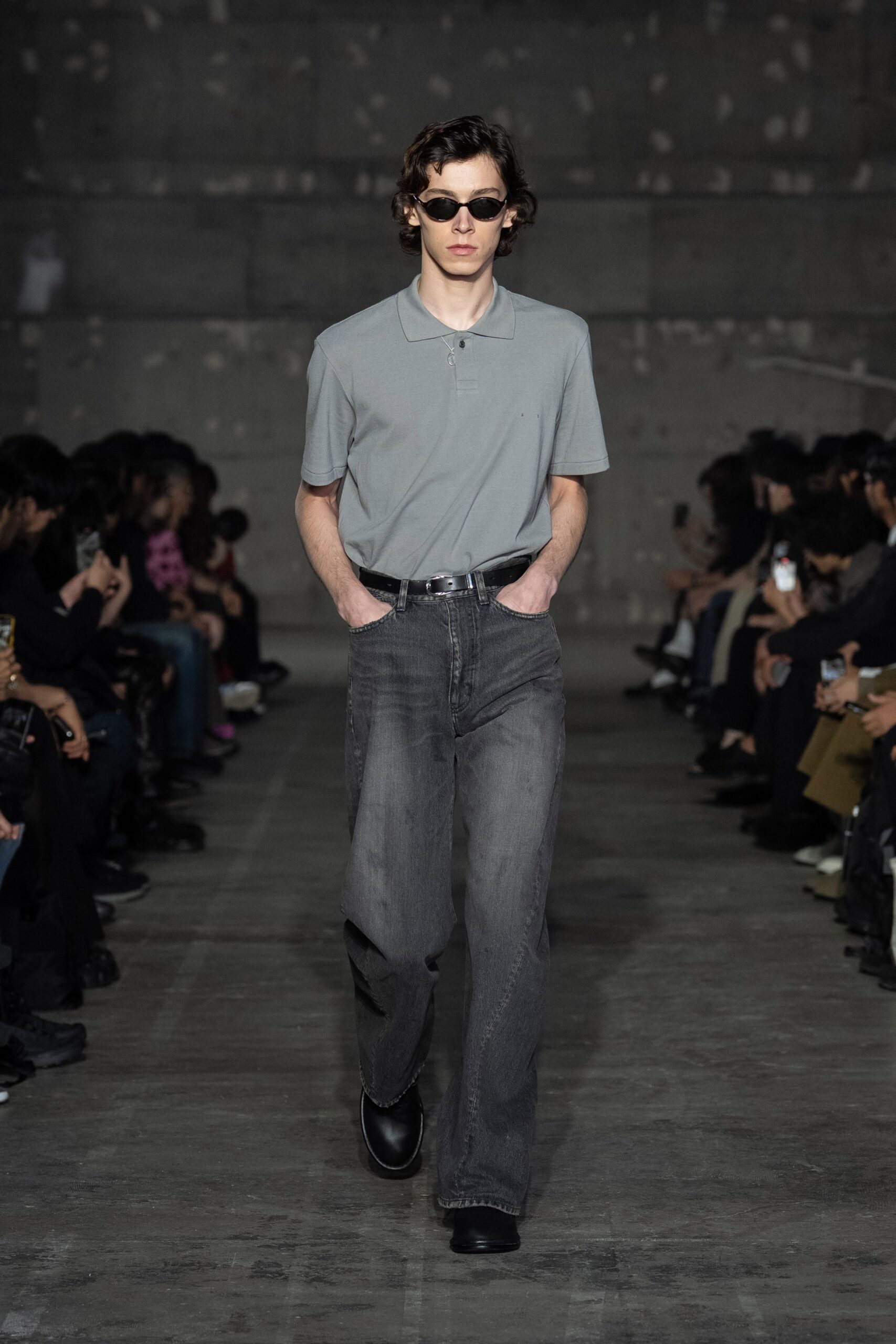 gray polo shirt and jeans