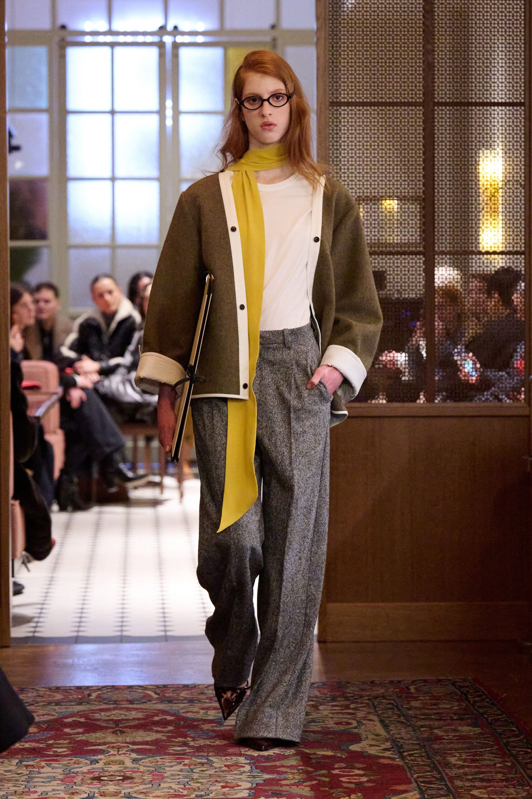 relaxed green jacket with gray pants