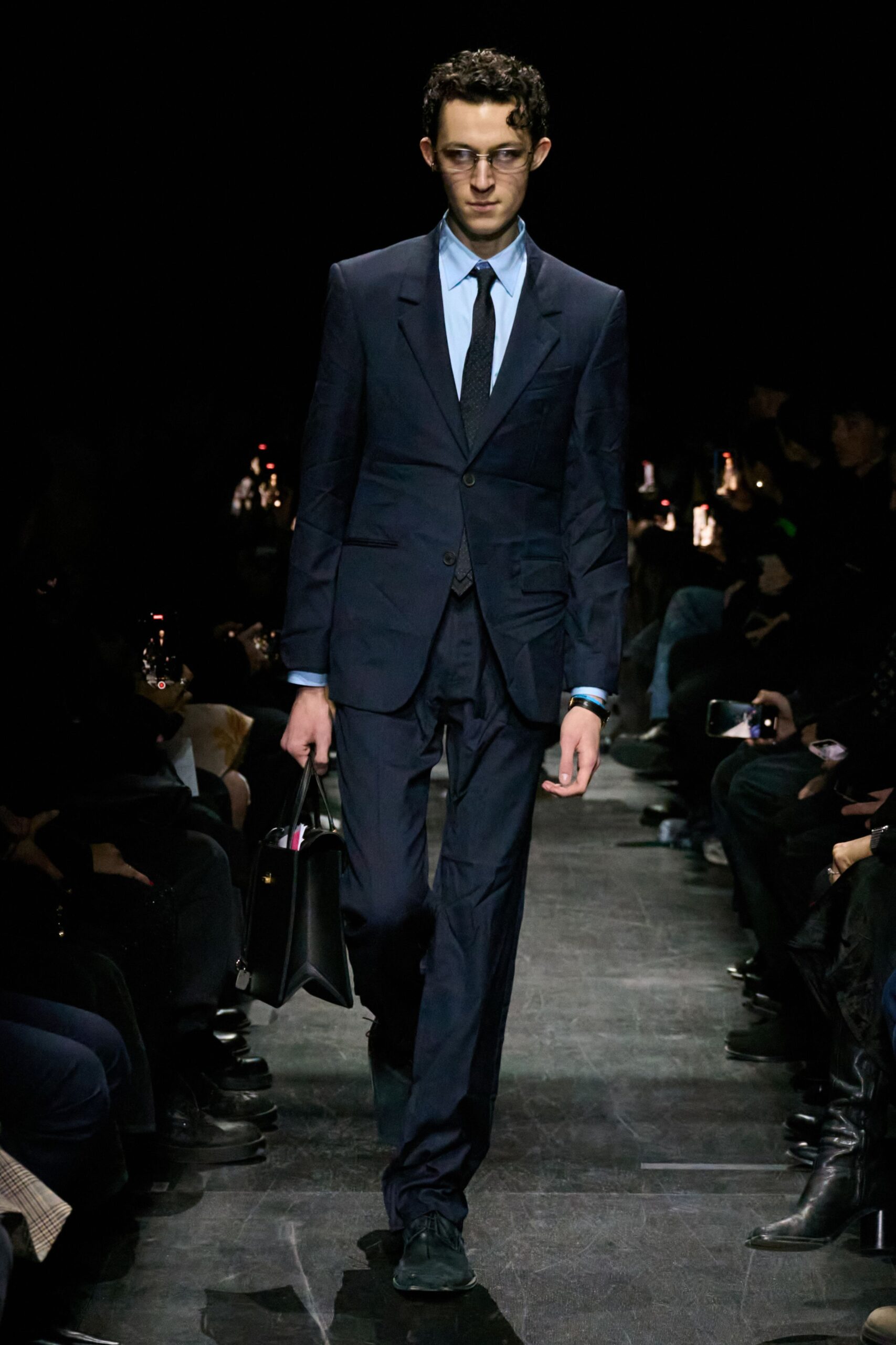 navy tailored suit with light blue shirt