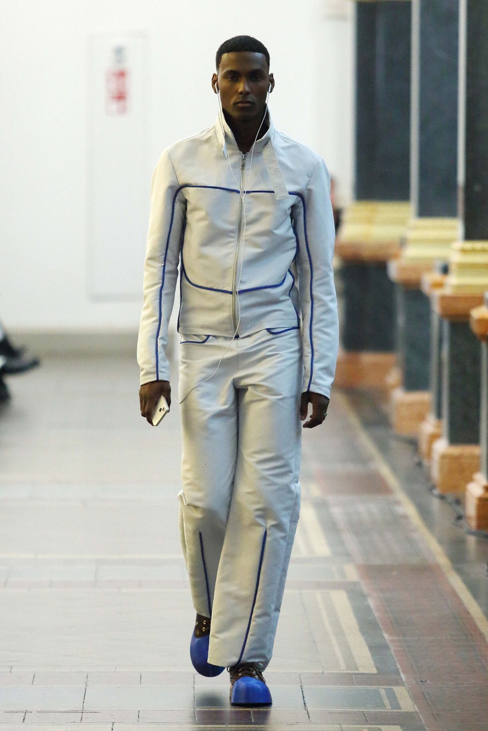 white fitted jacket with relaxed pants