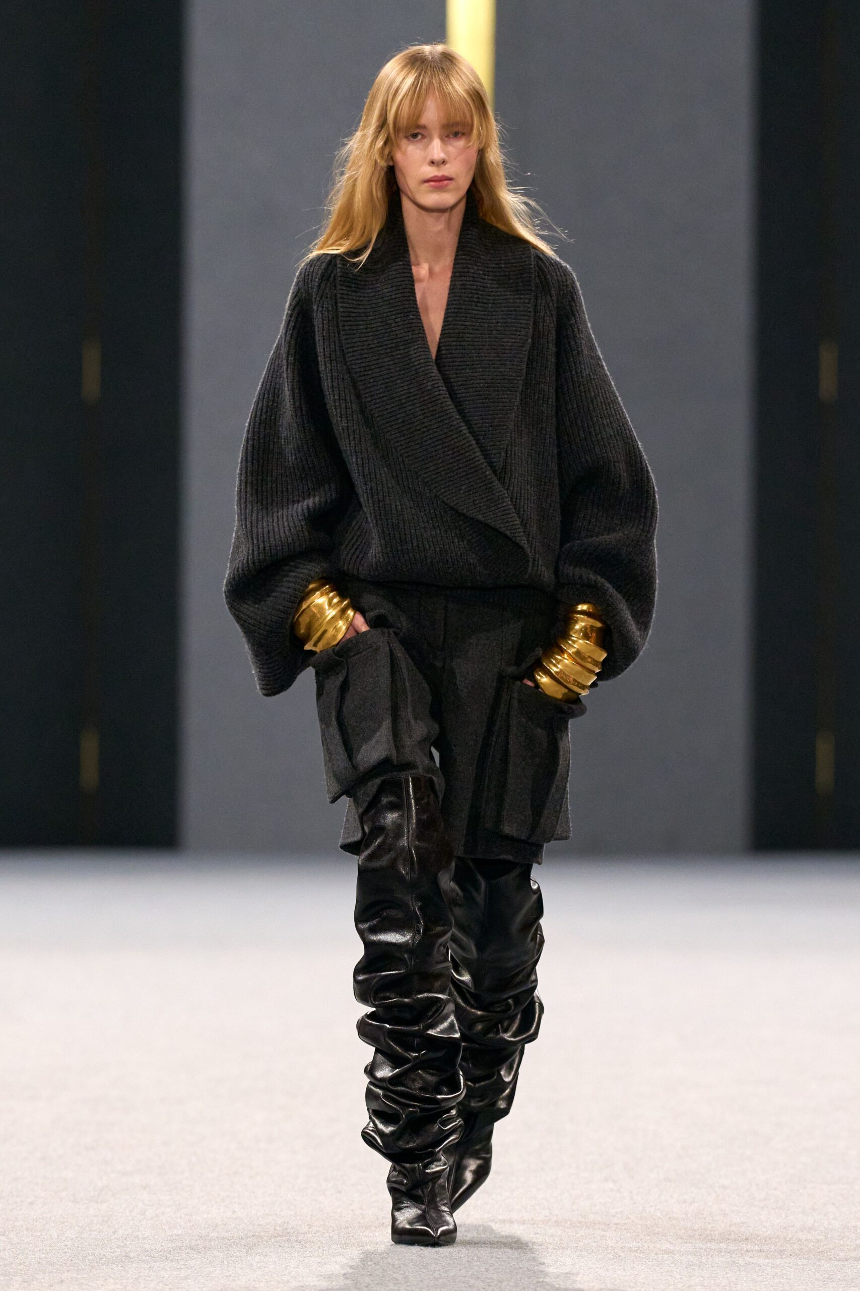 black wool long-sleeve collared oversized draped coat