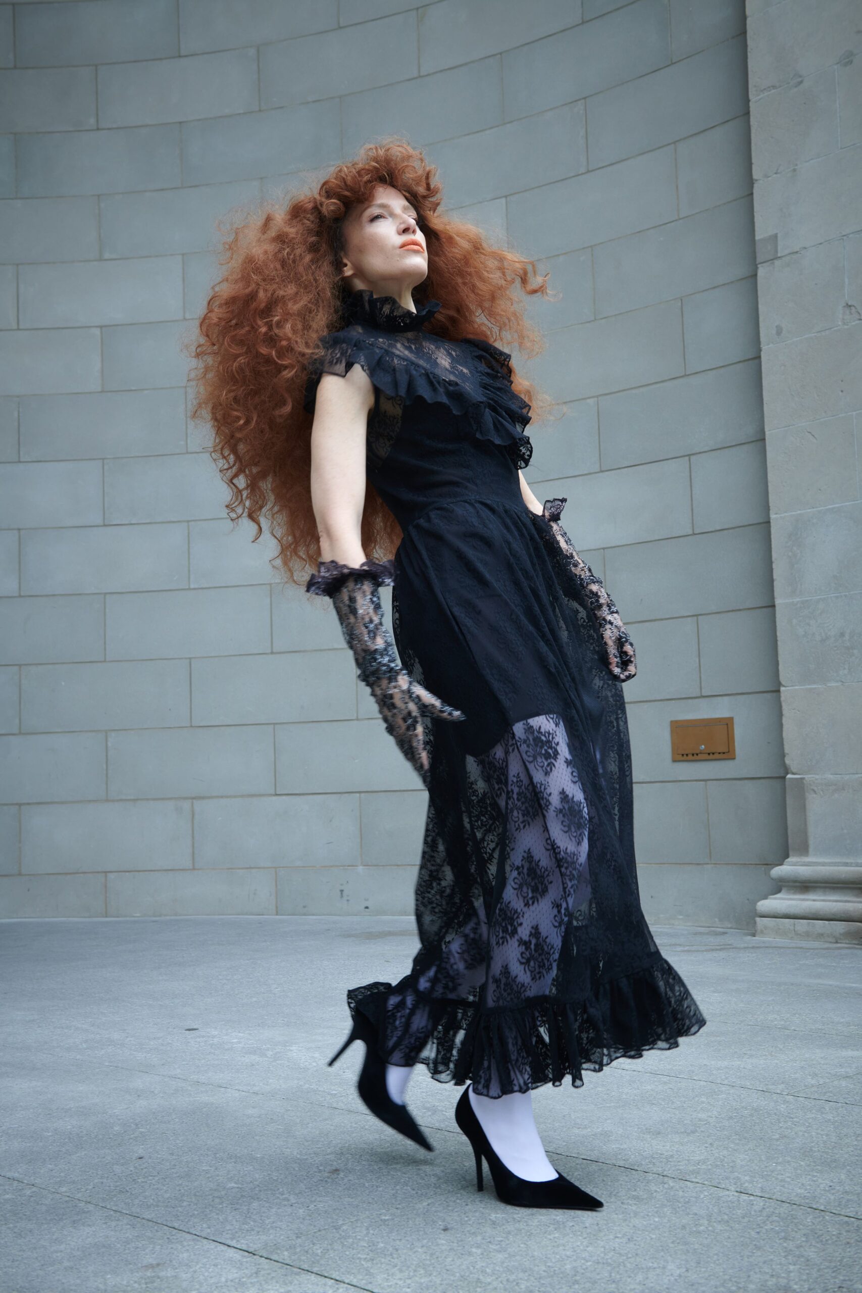 black lace sleeveless high-neck fitted ruffled layered dress