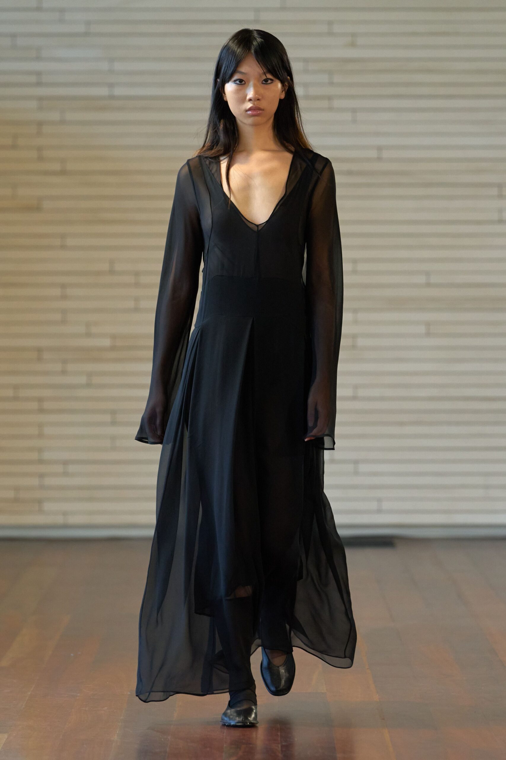 black chiffon long-sleeve v-neck fitted draped flowing gown