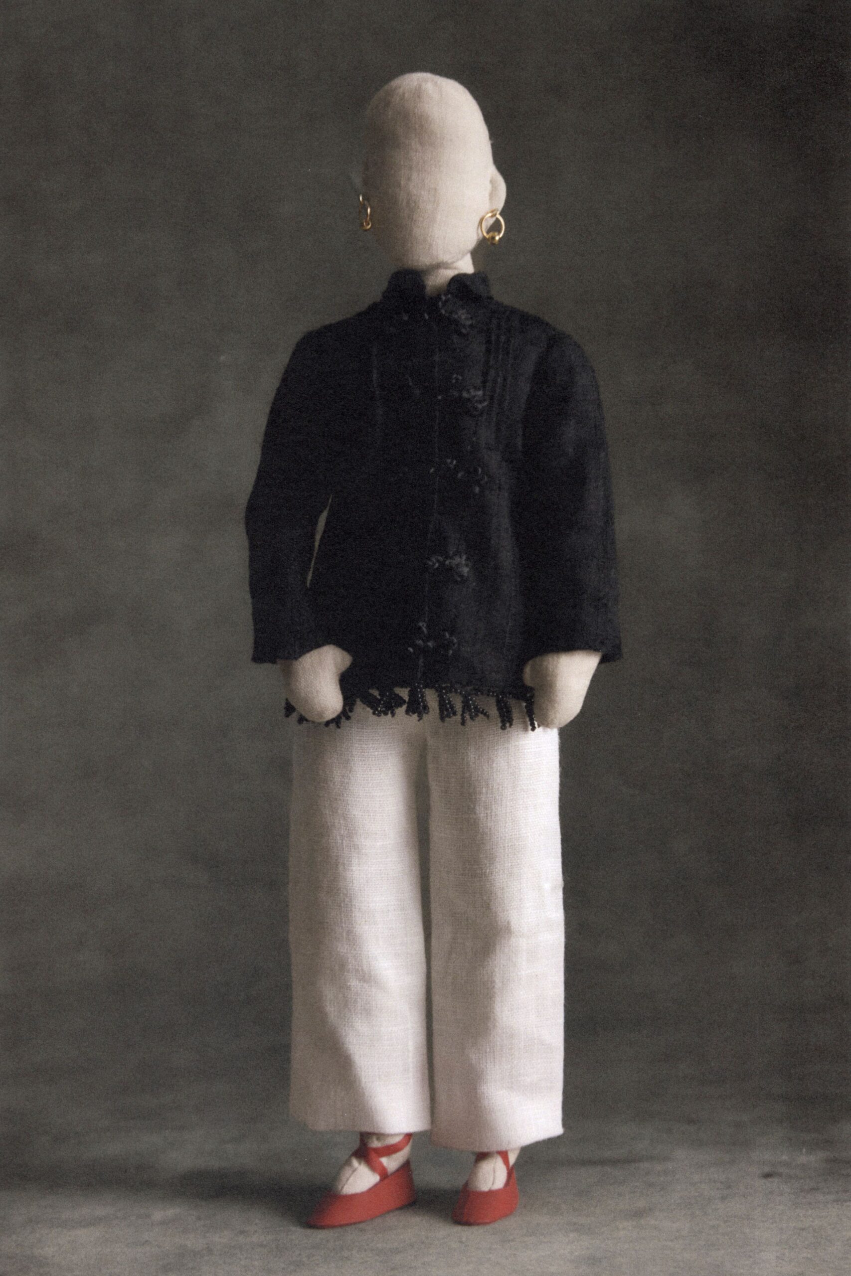 black velvet long-sleeve high-neck structured buttoned fringed jacket