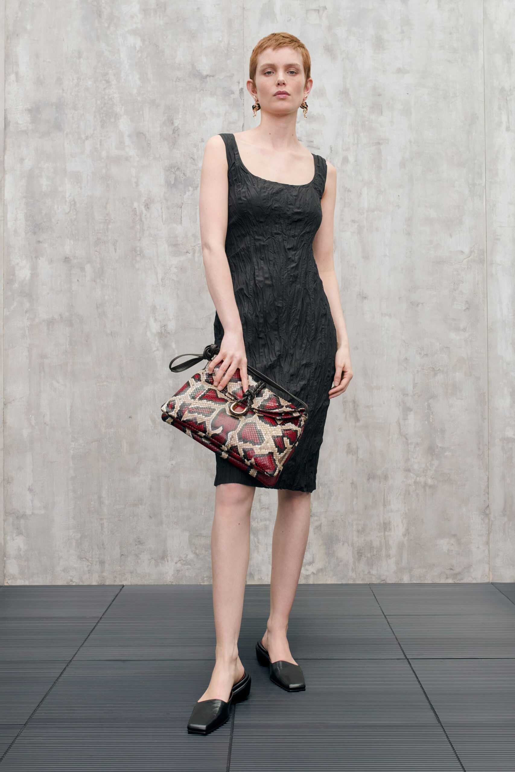 black fitted midi dress