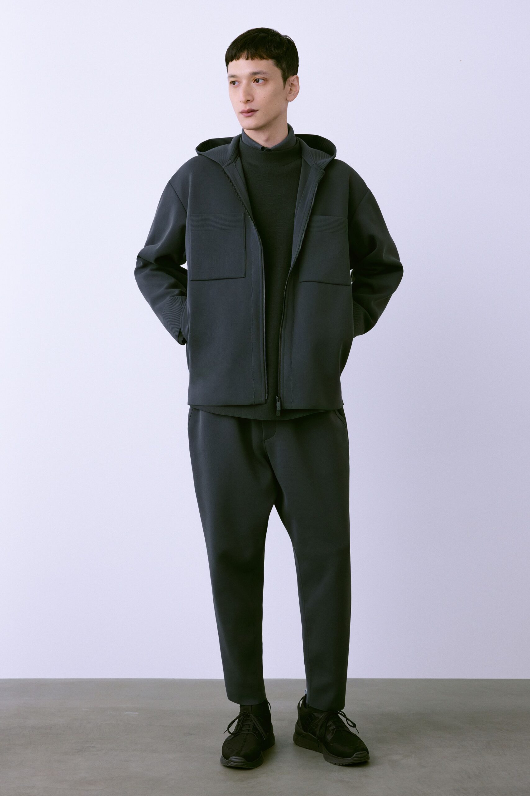 black neoprene jacket and pants