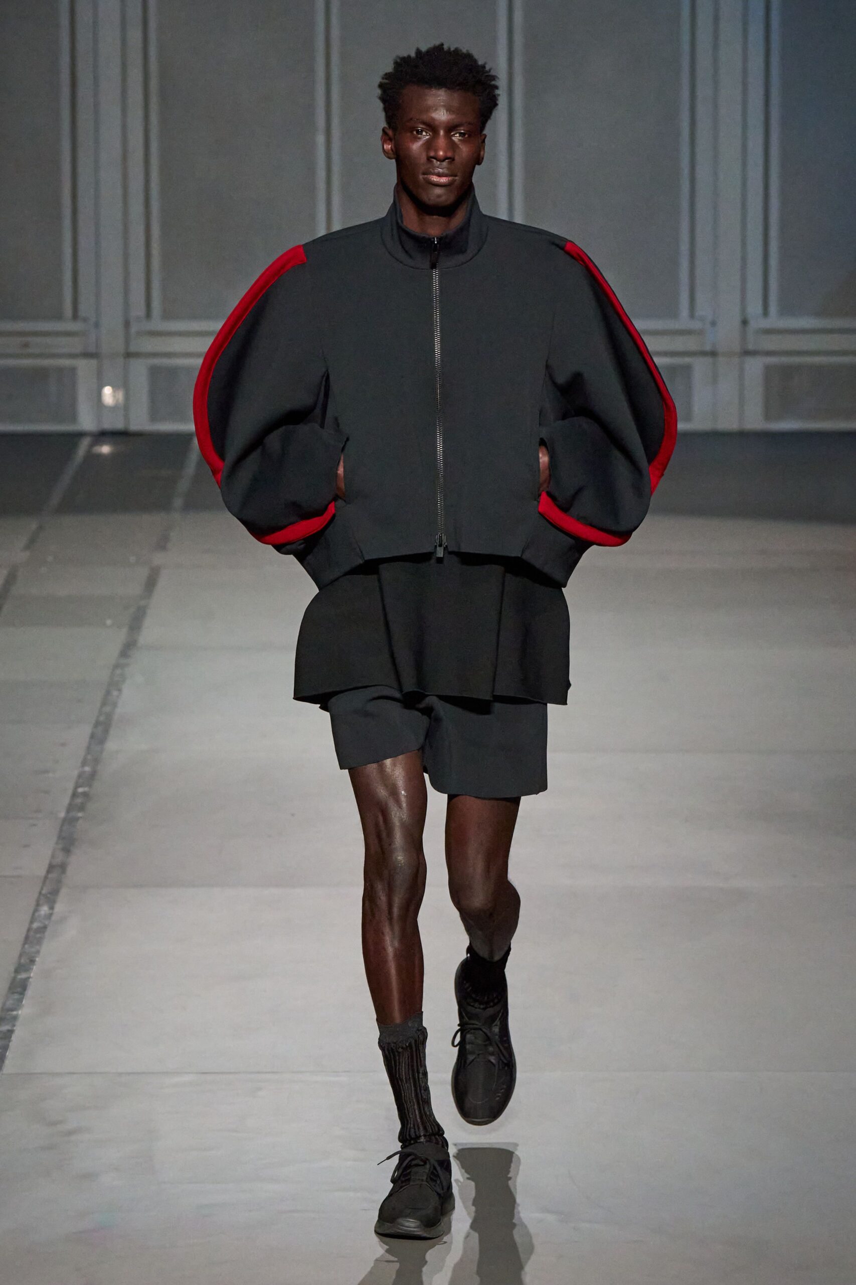 black relaxed jacket with red accents