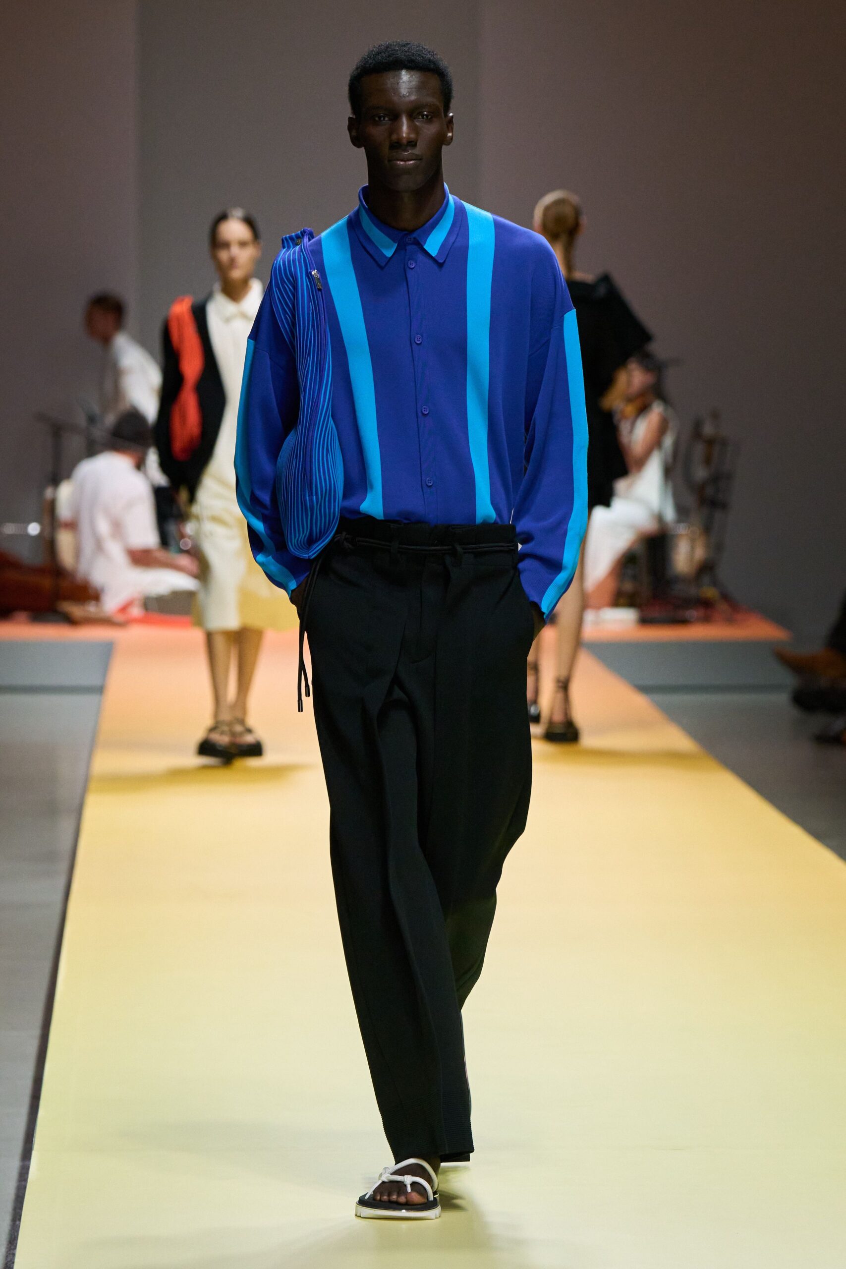 blue relaxed shirt with black pants