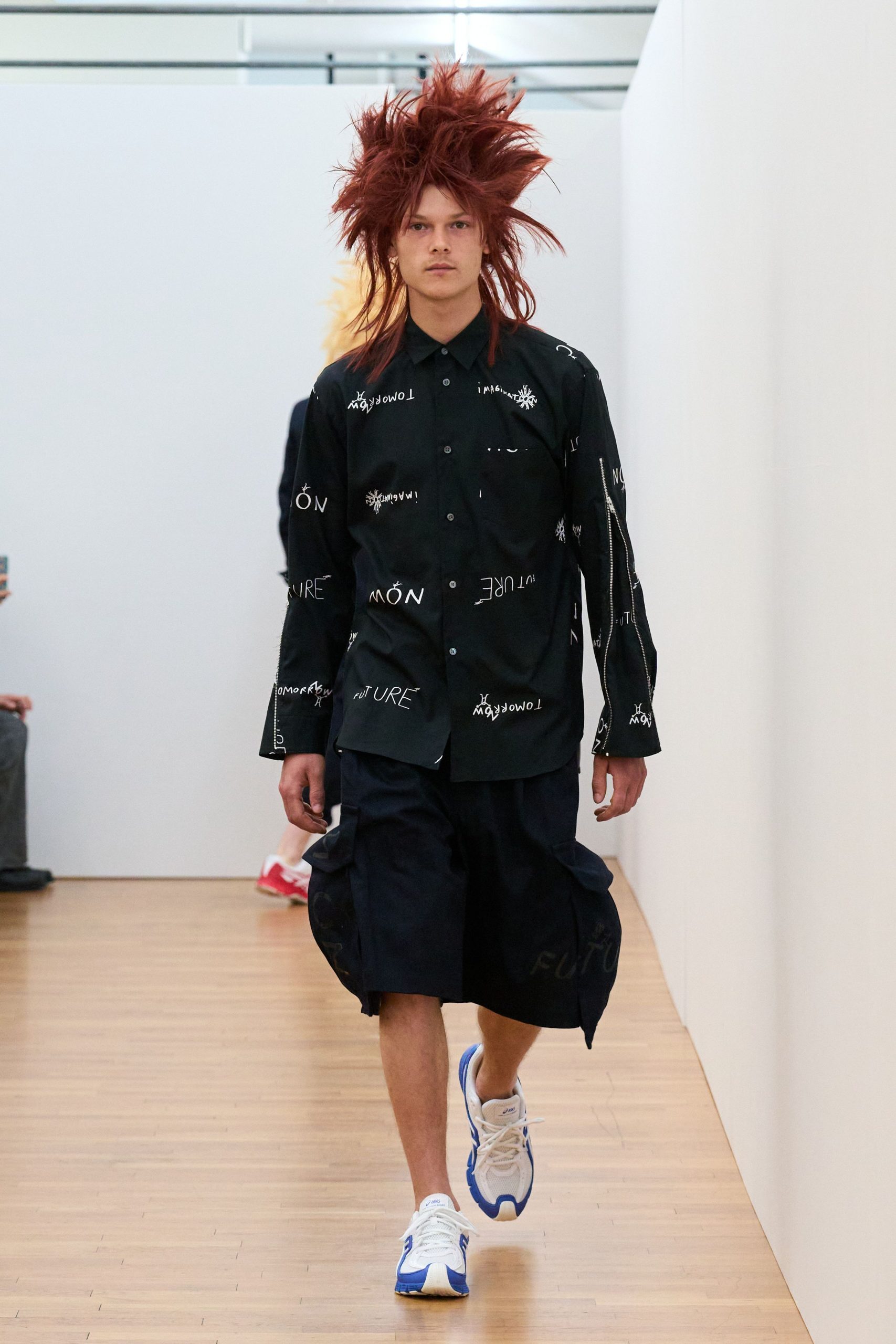 black relaxed shirt with navy shorts