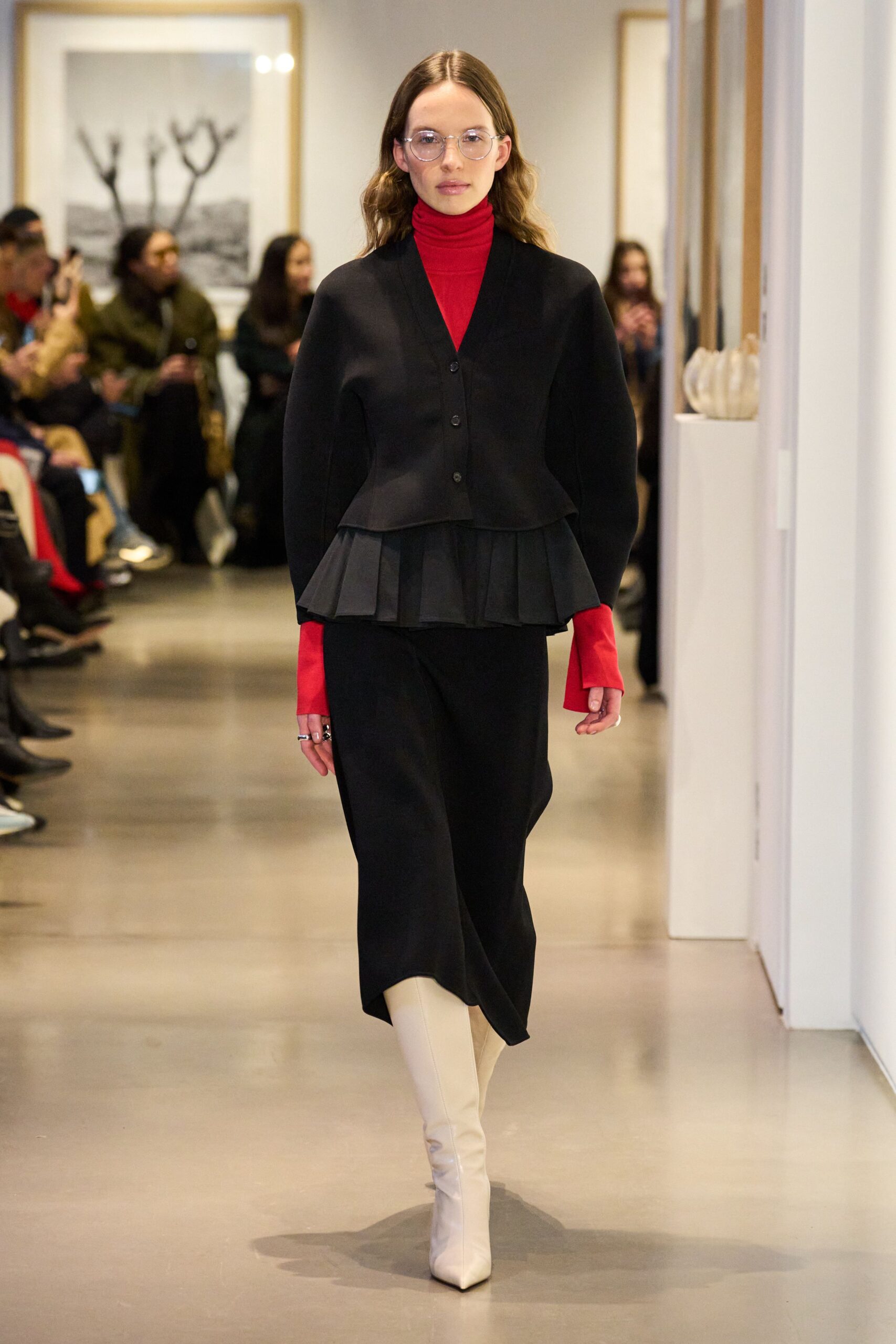 black top red dress black skirt white boots