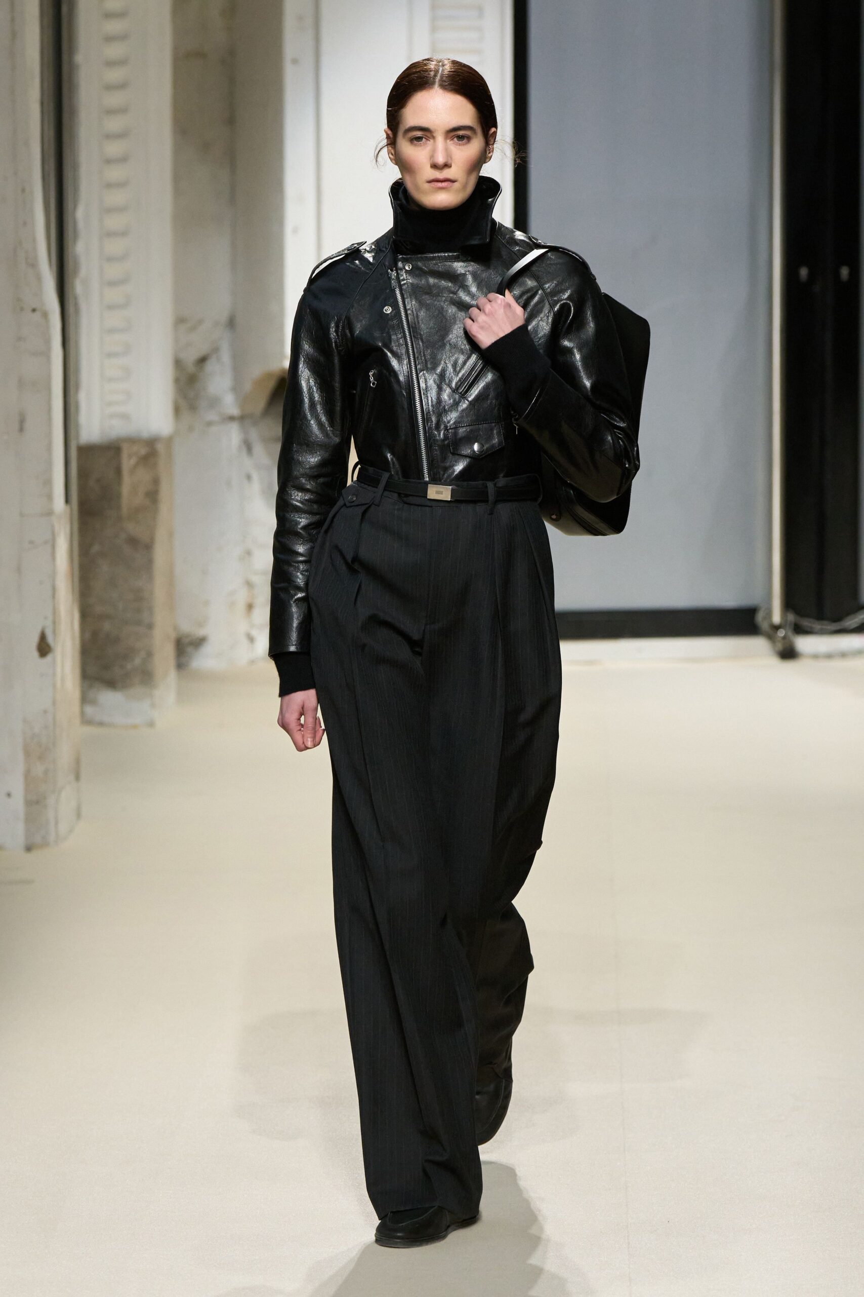 black leather jacket with relaxed pants