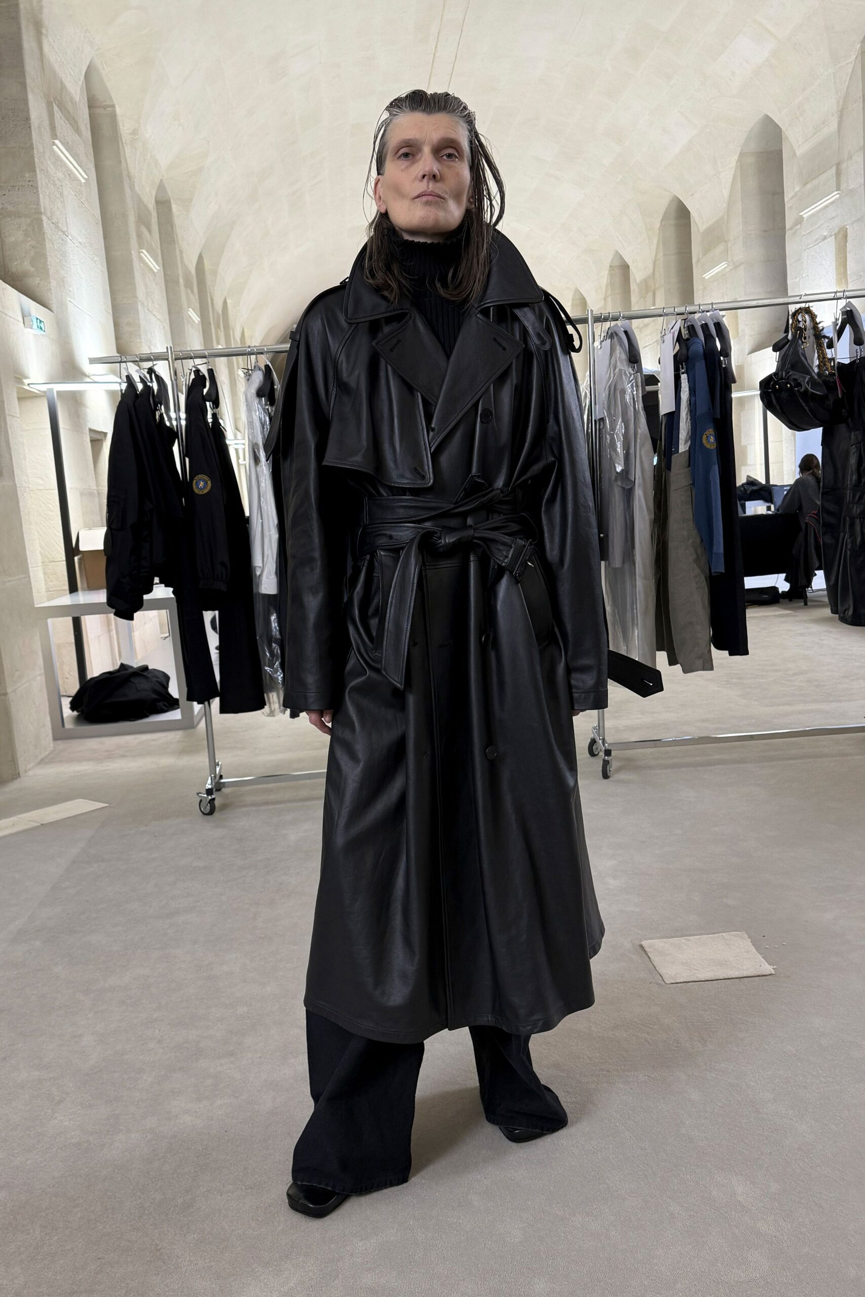 black leather coat with wide-leg pants