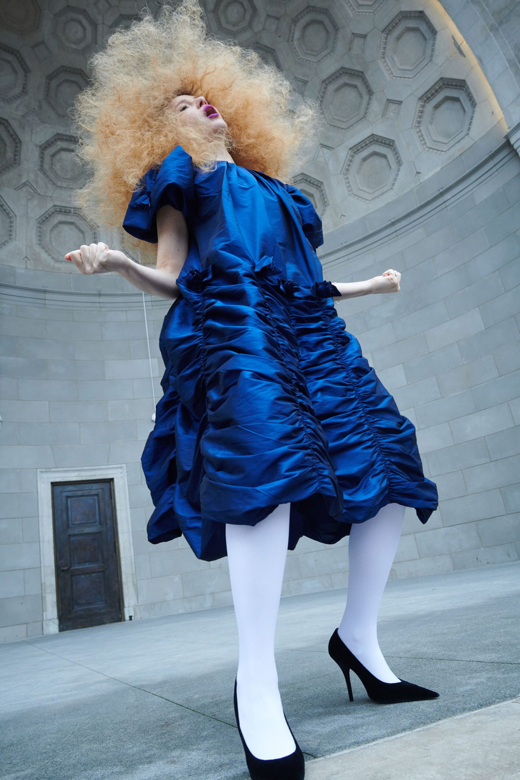 blue ruffled midi dress with heels