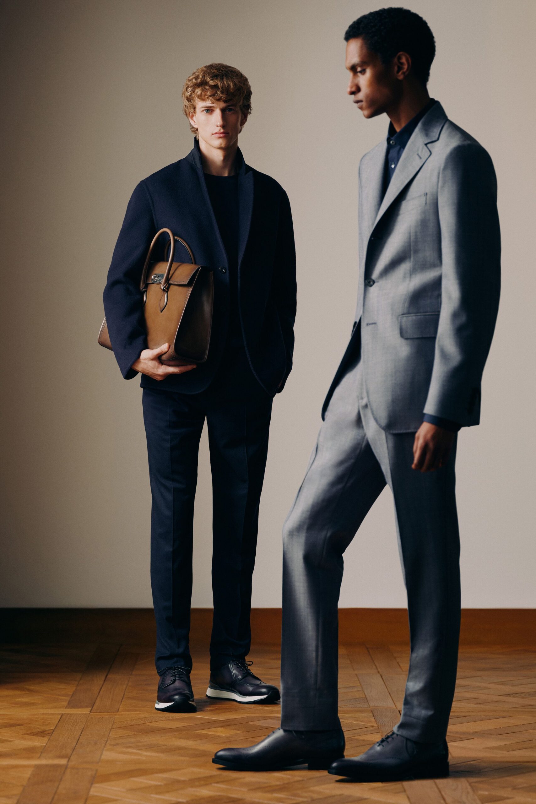gray tailored suit with blue shirt
