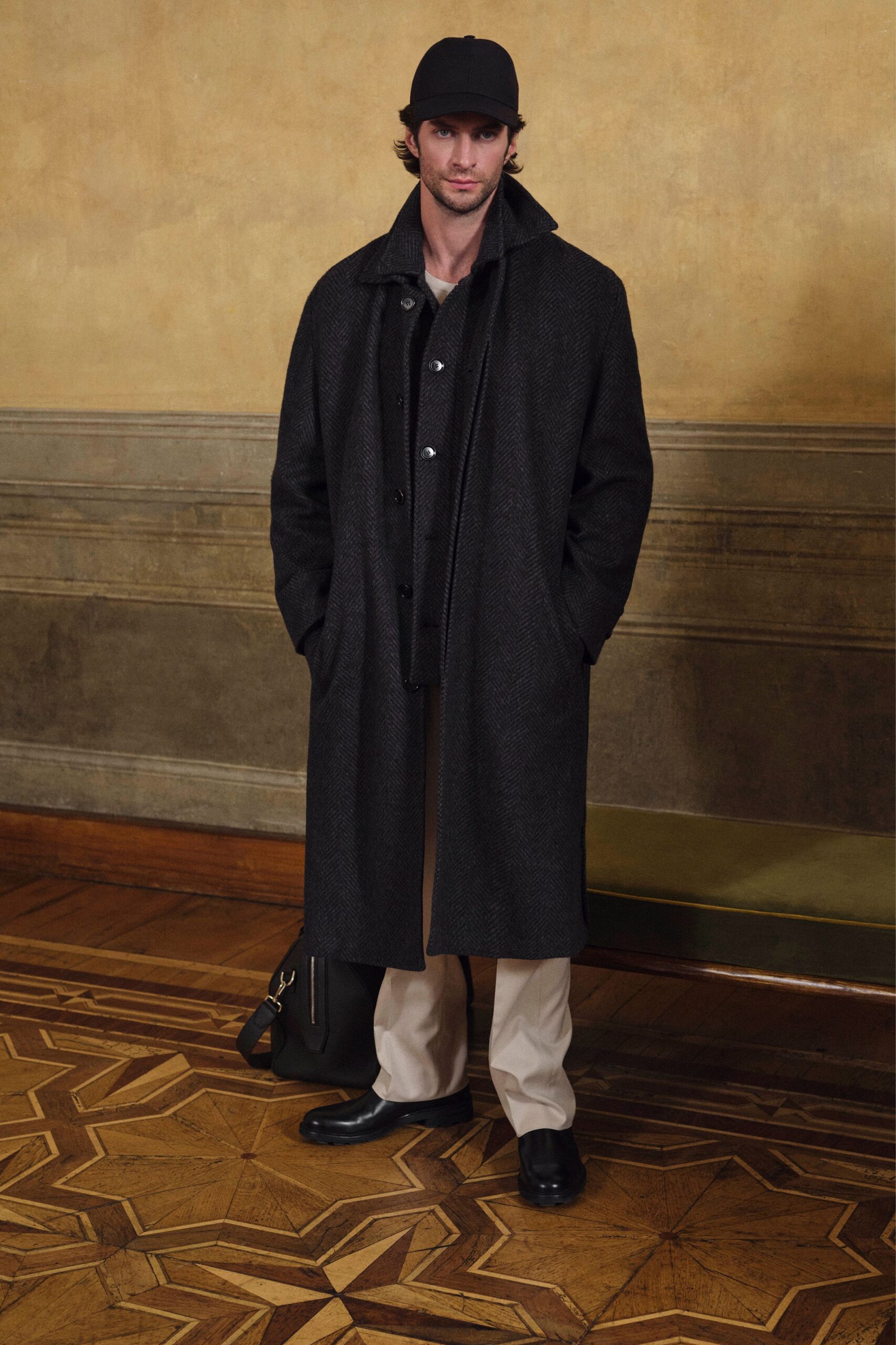 black wool coat with beige pants