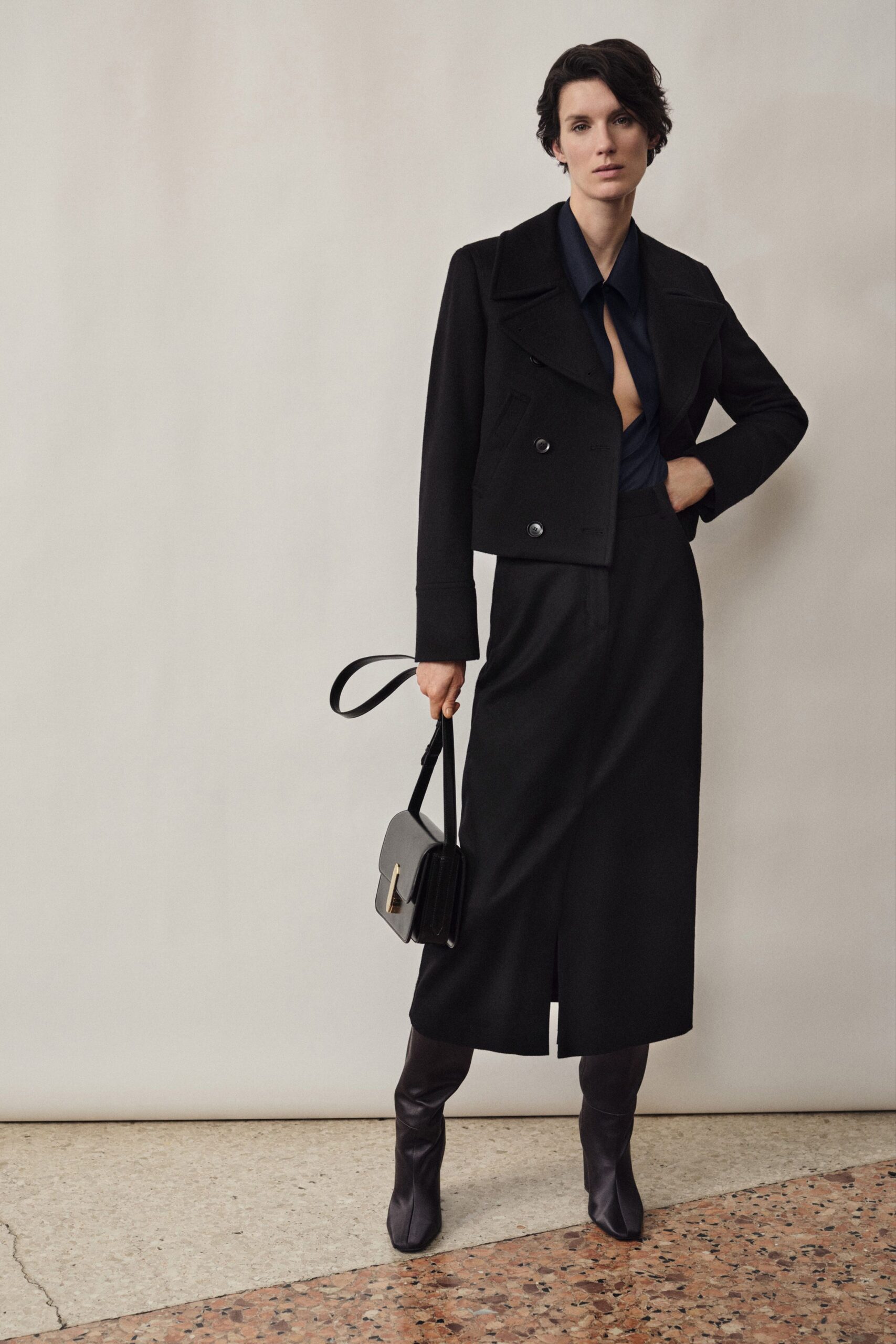 black wool long-sleeve collared structured jacket