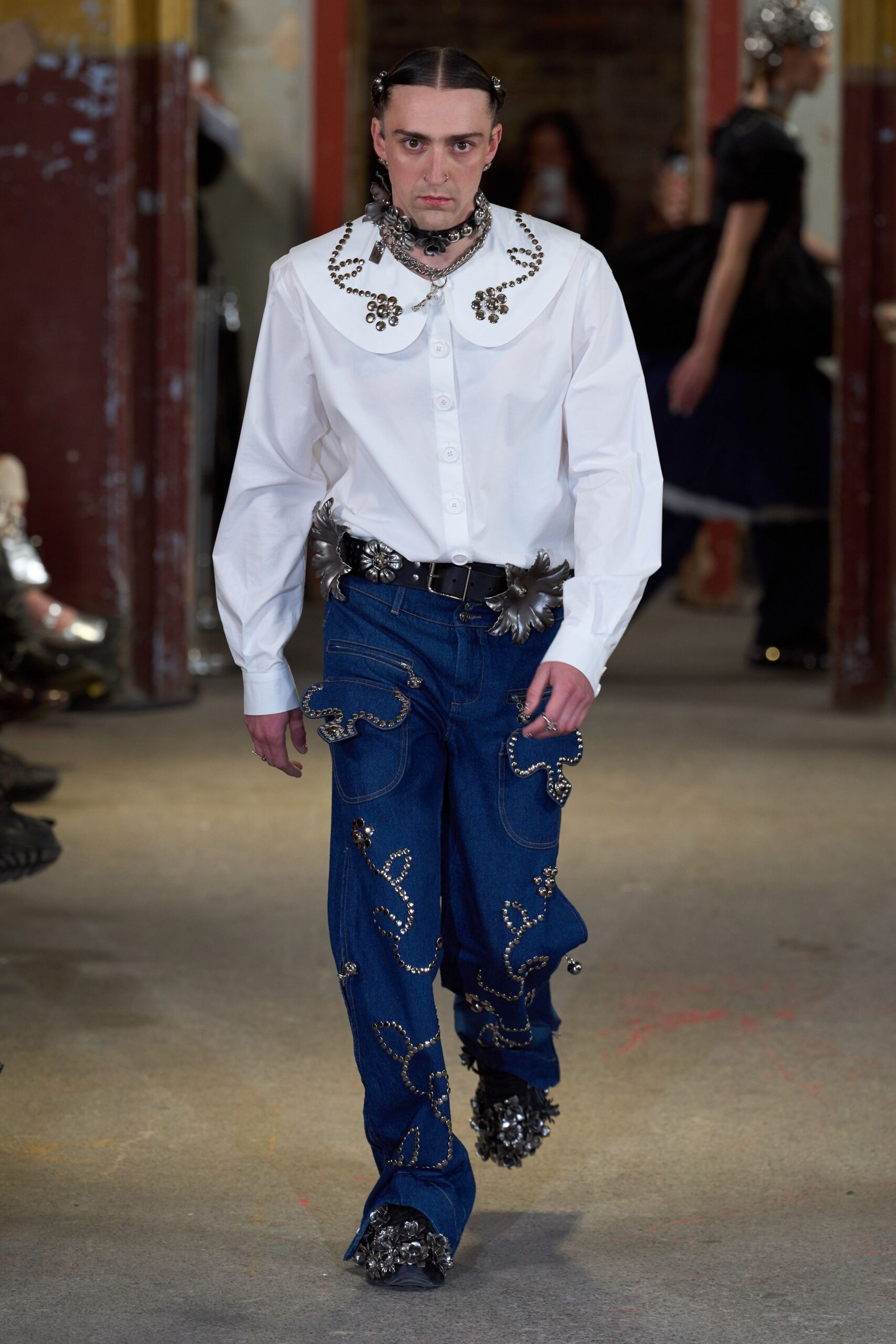 white shirt blue distressed pants