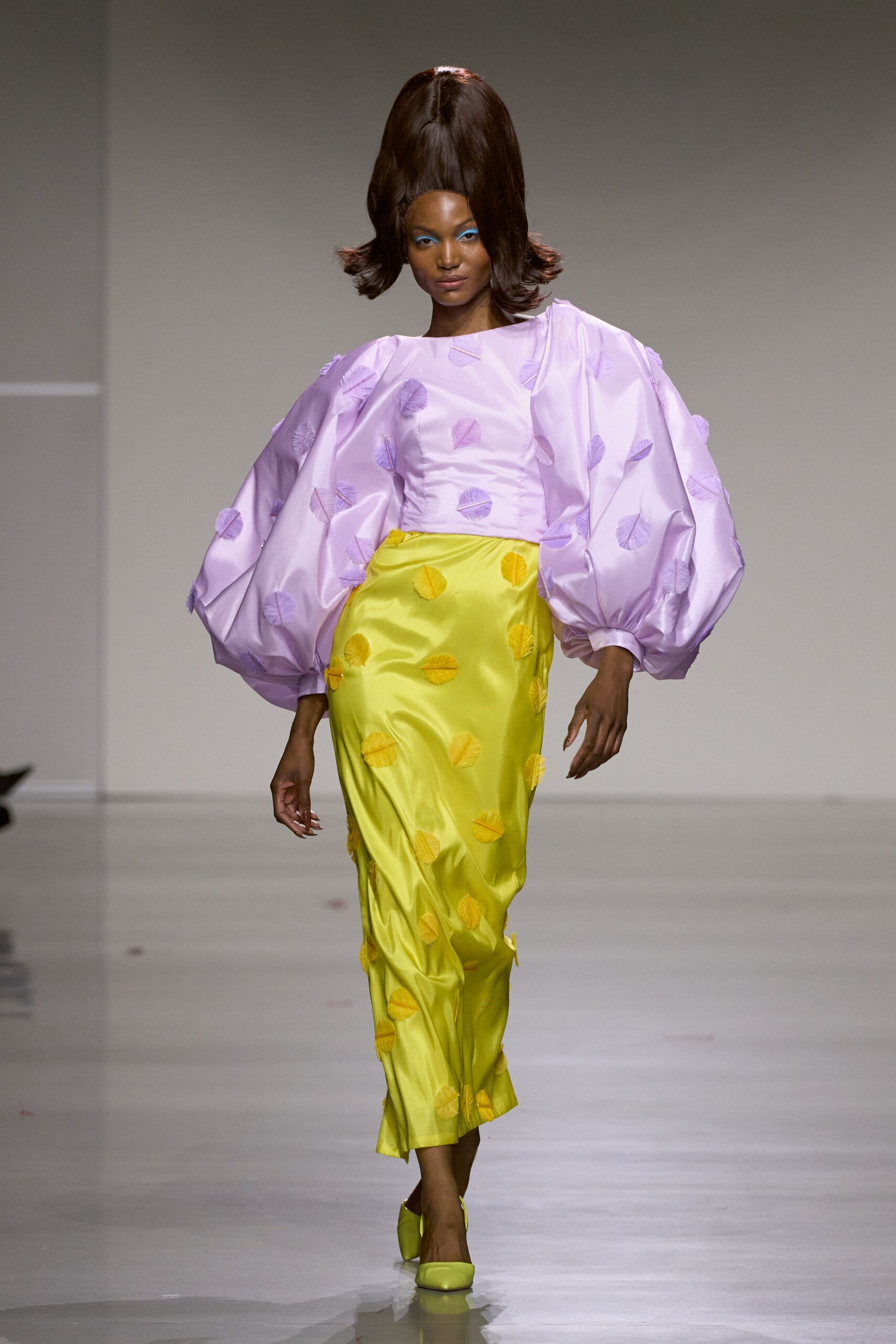pink fitted top yellow skirt