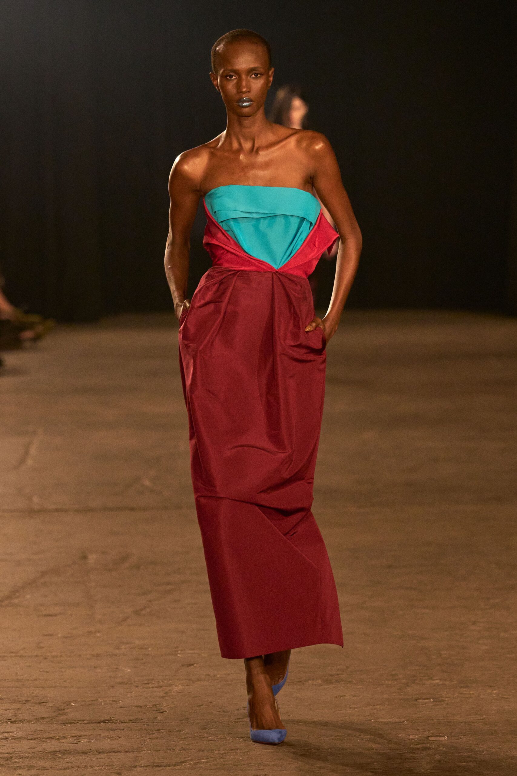 red silk strapless fitted pleated maxi gown