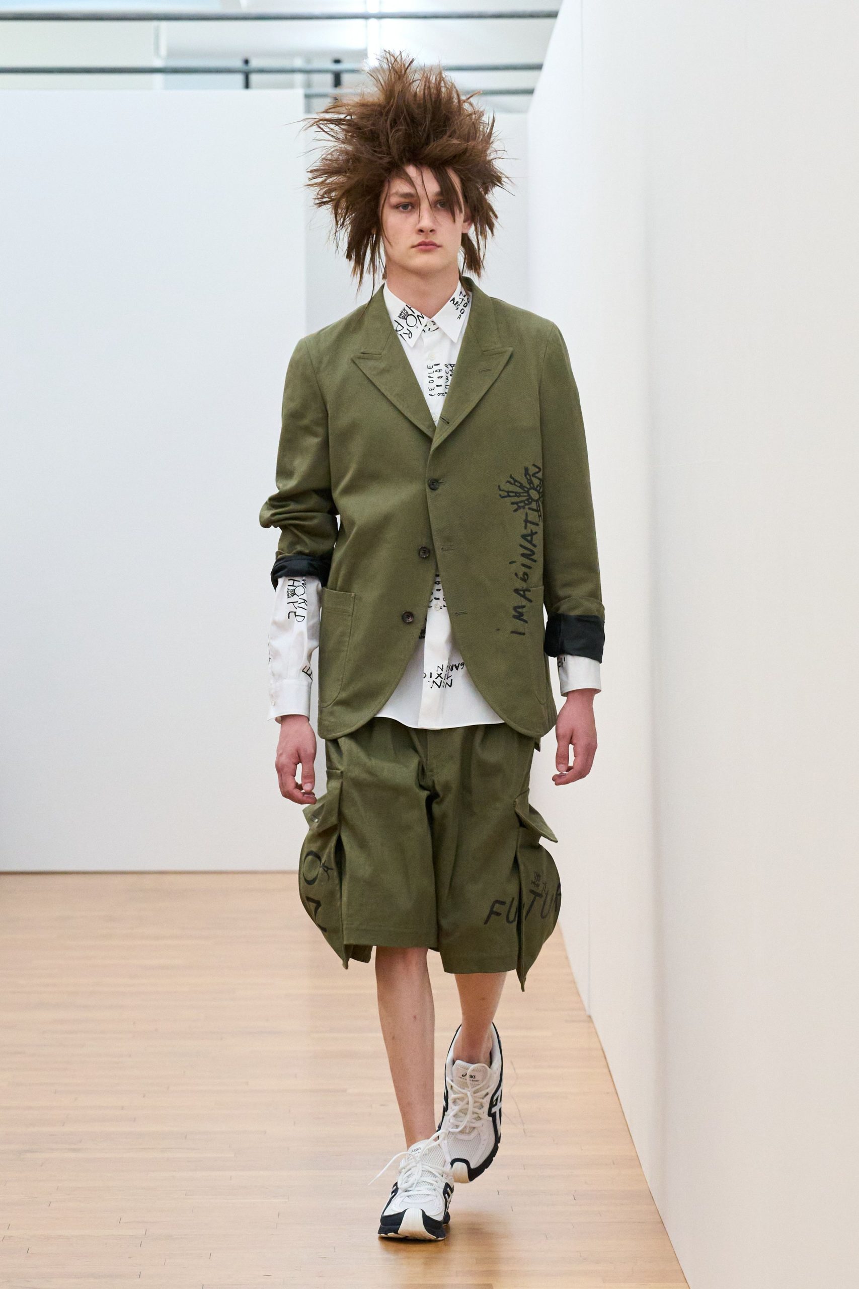 green blazer white shirt shorts