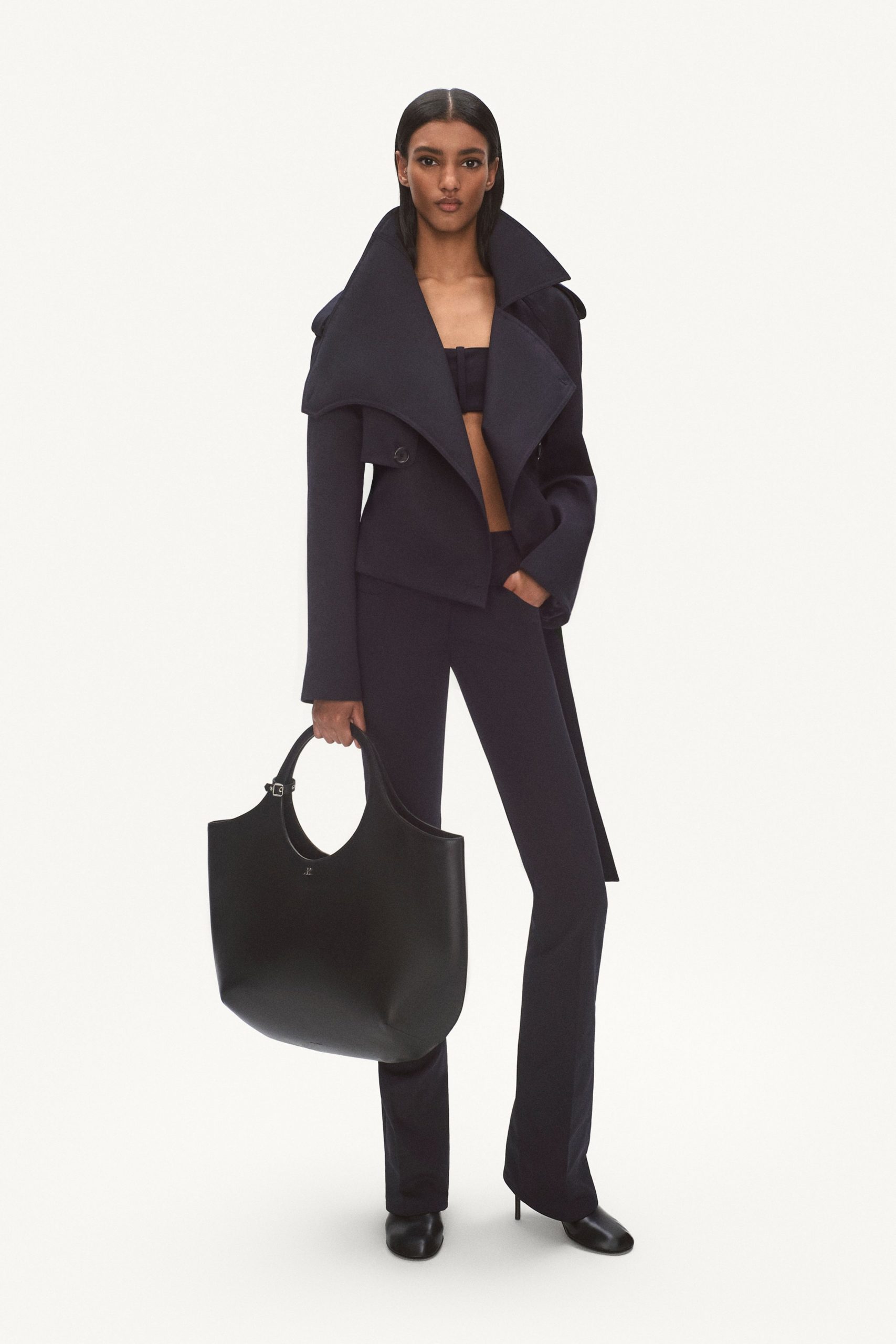 black structured jacket with fitted top