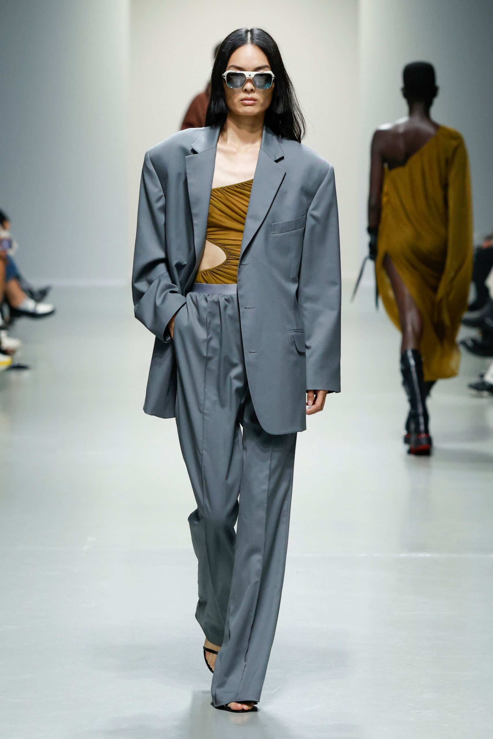 gray blazer and pants with brown bodysuit