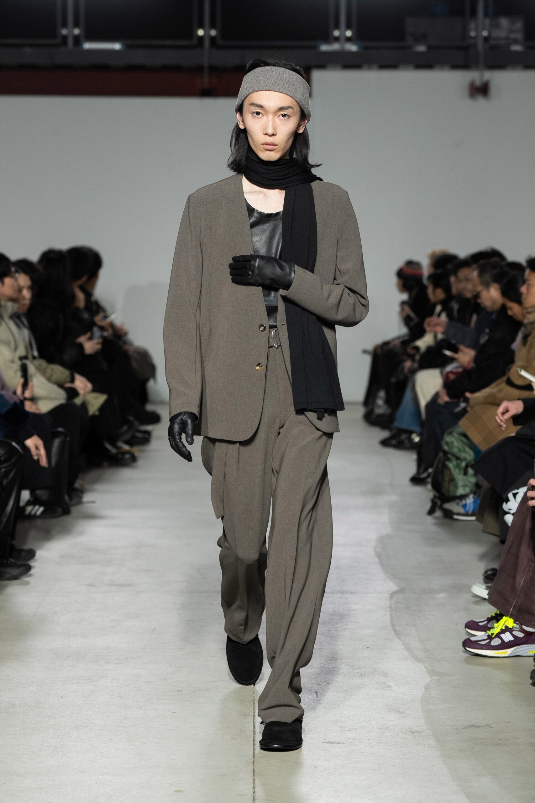 gray tailored suit with black top