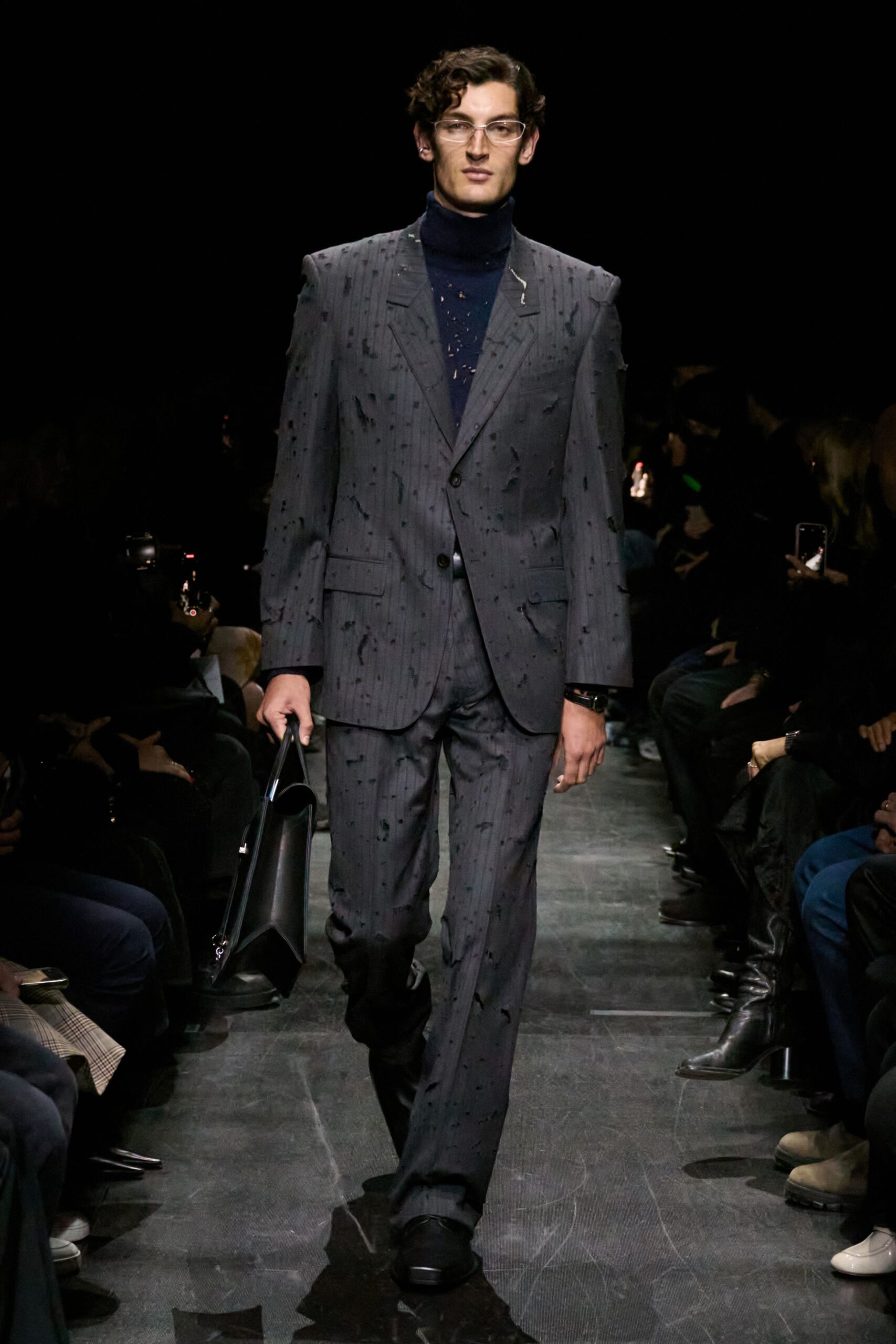 gray tailored suit with black shirt